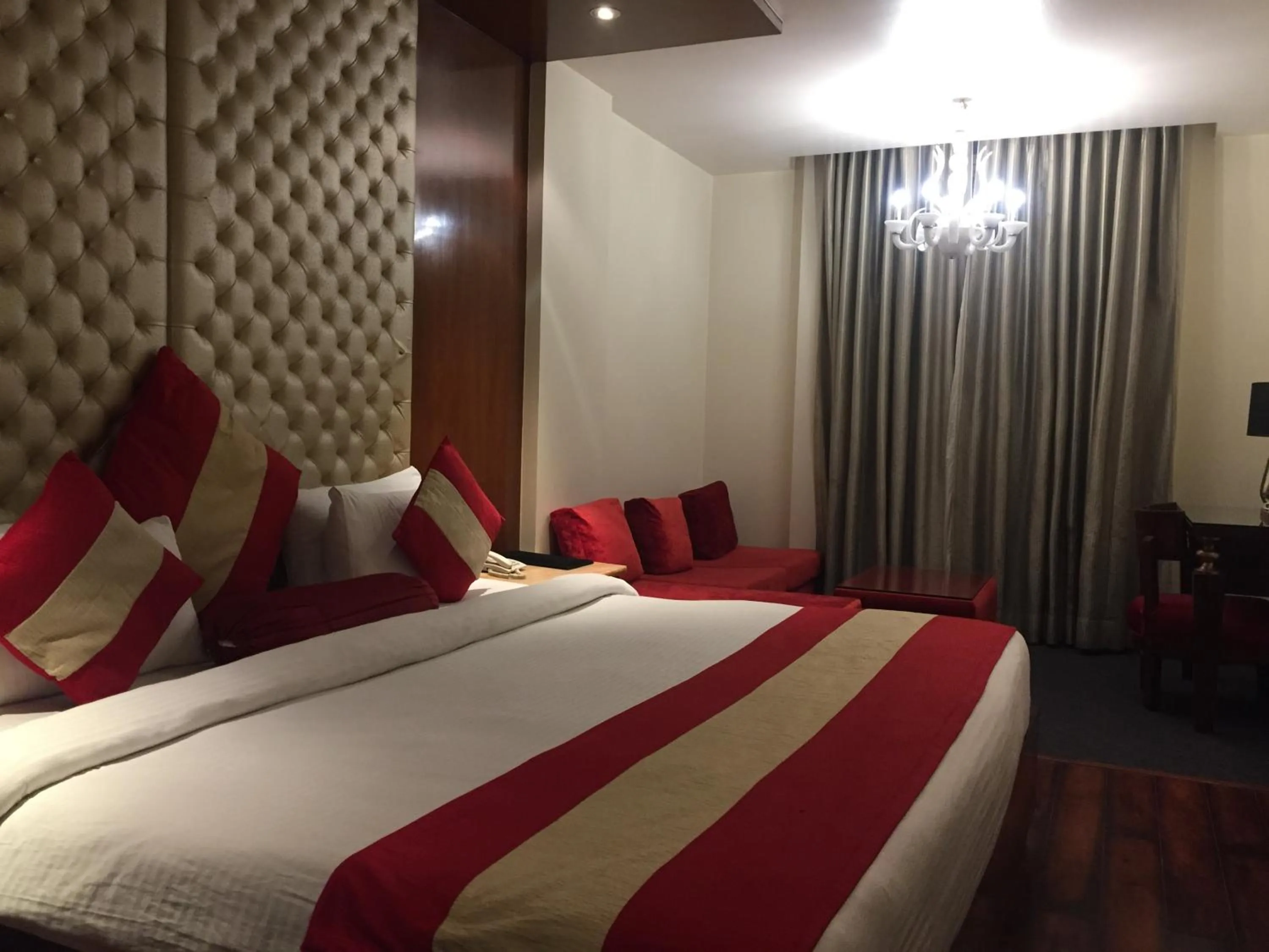 Photo of the whole room, Bed in Hotel Aura - New Delhi Railway Station