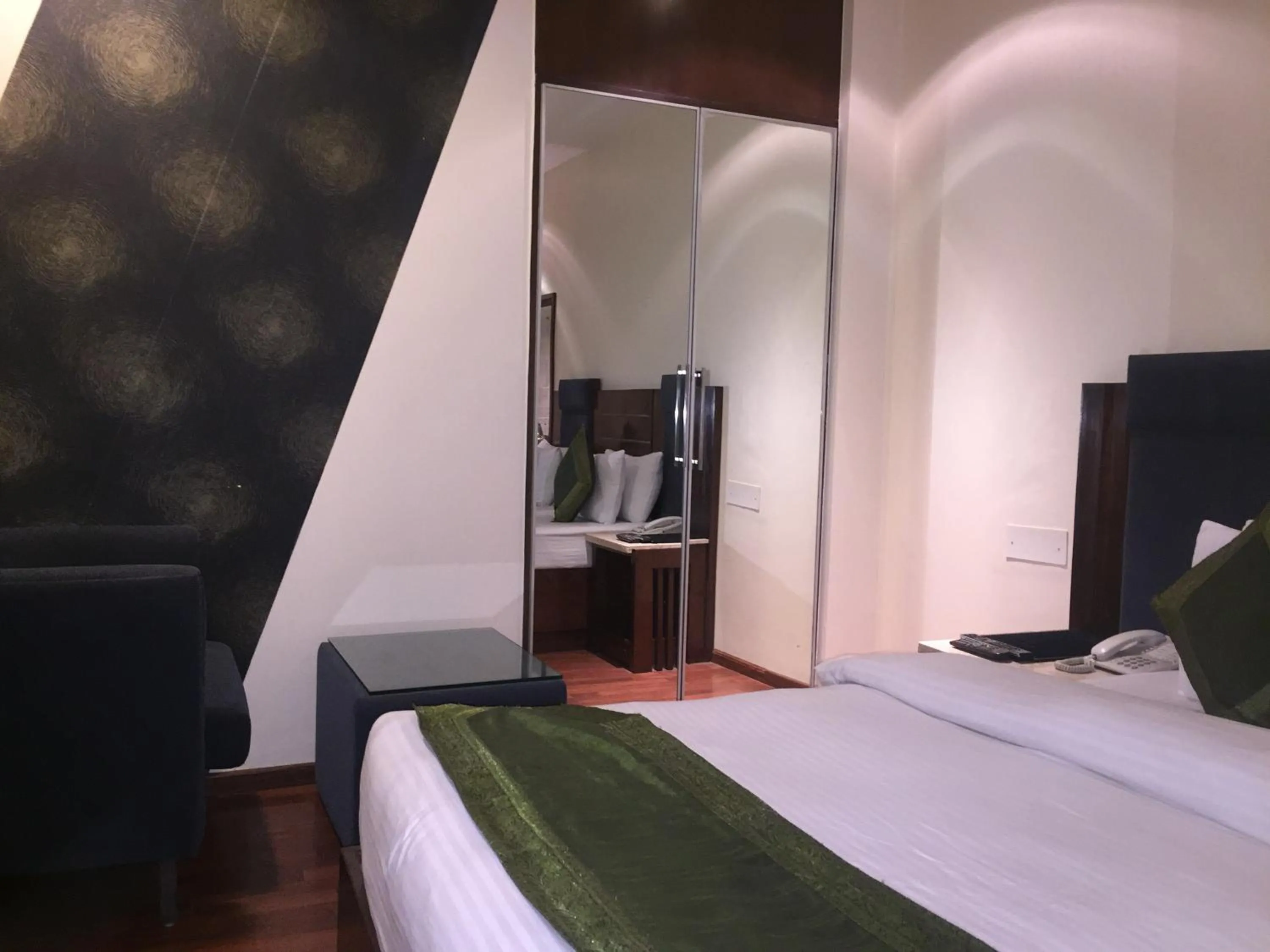 Photo of the whole room, Bed in Hotel Aura - New Delhi Railway Station