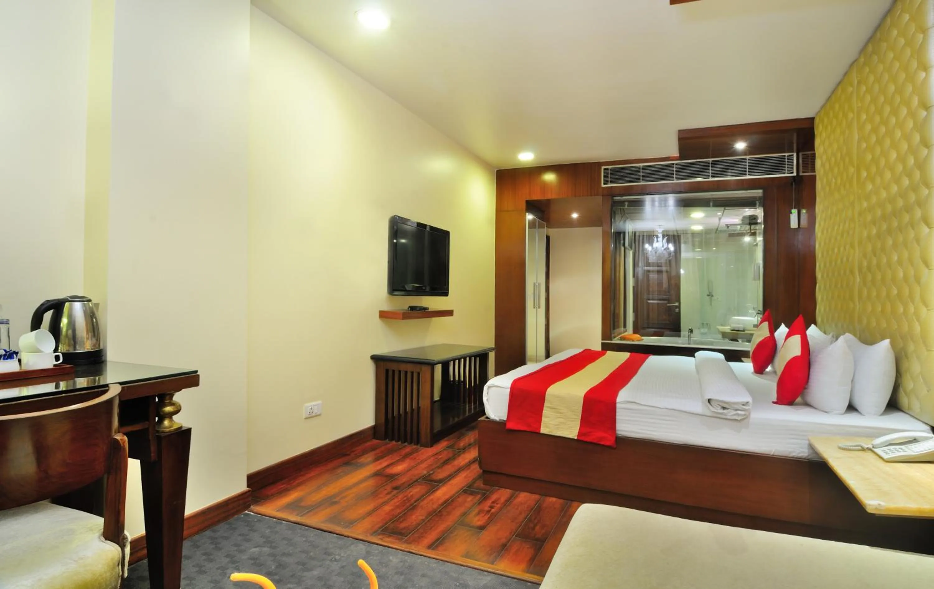 Photo of the whole room, Bed in Hotel Aura - New Delhi Railway Station