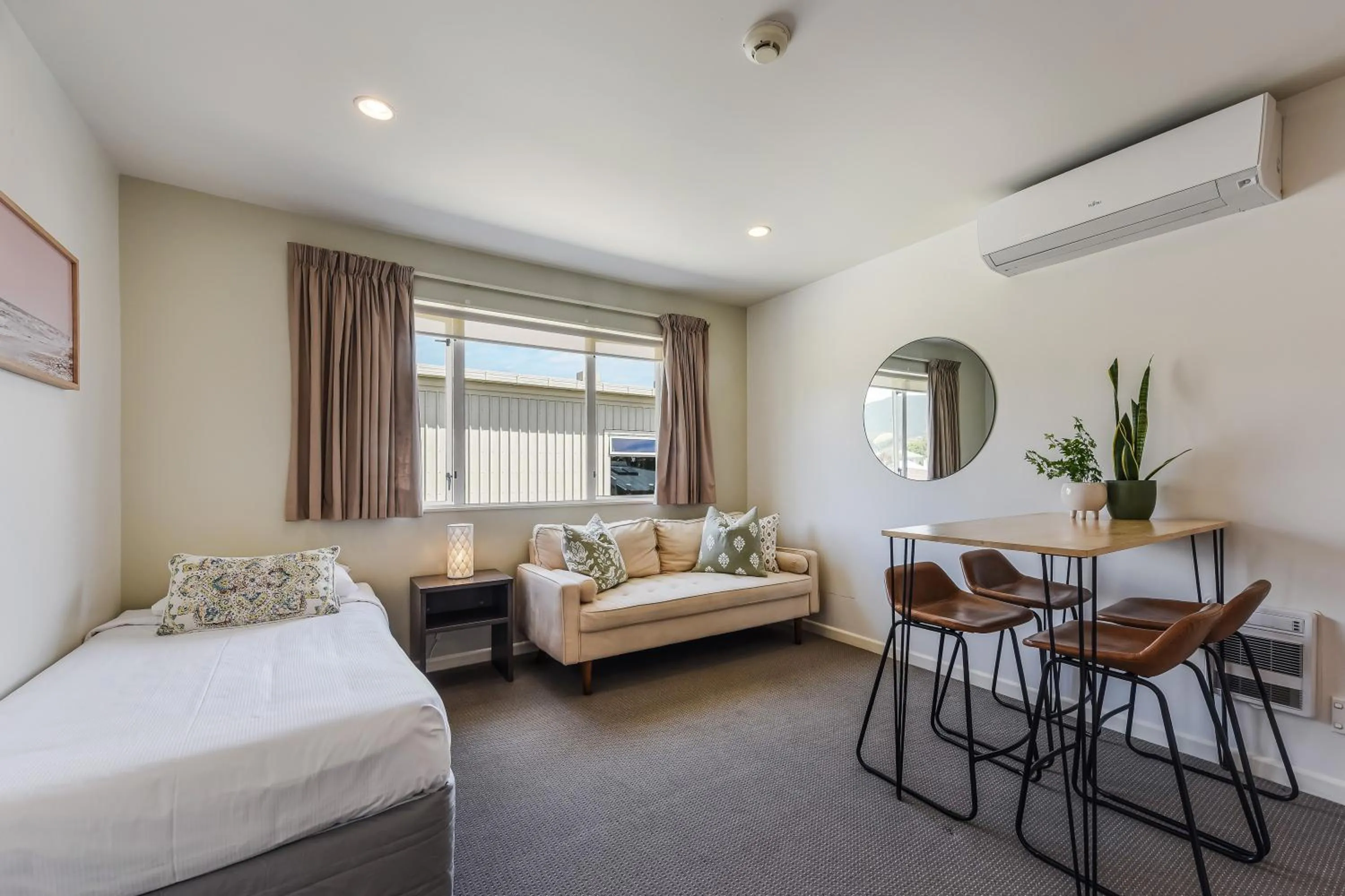 Living room, Bed in Boutique Motel