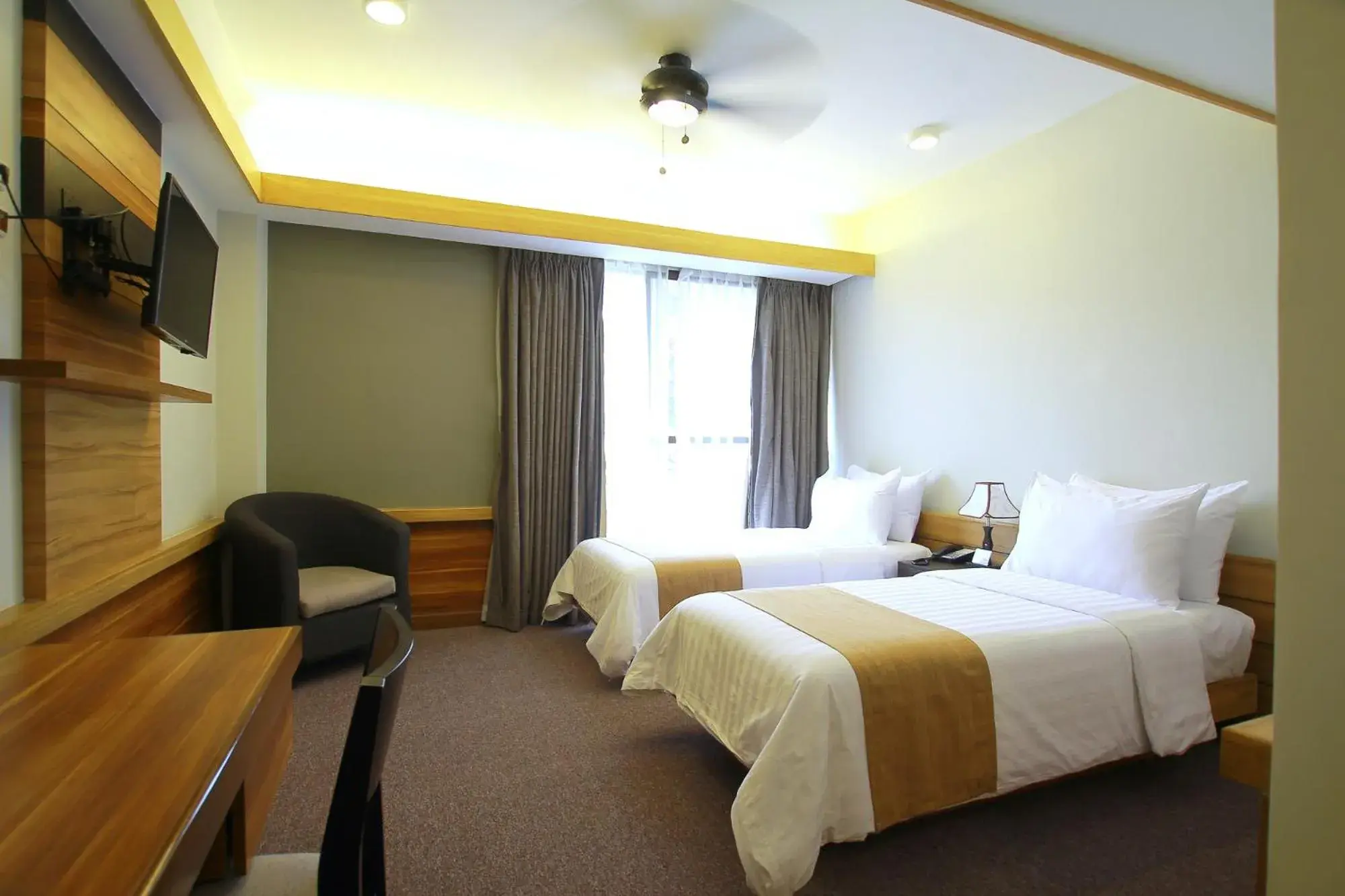 Photo of the whole room, Bed in Grand Sierra Pines Baguio Photo of the whole room, Bed in Grand Sierra Pines Baguio