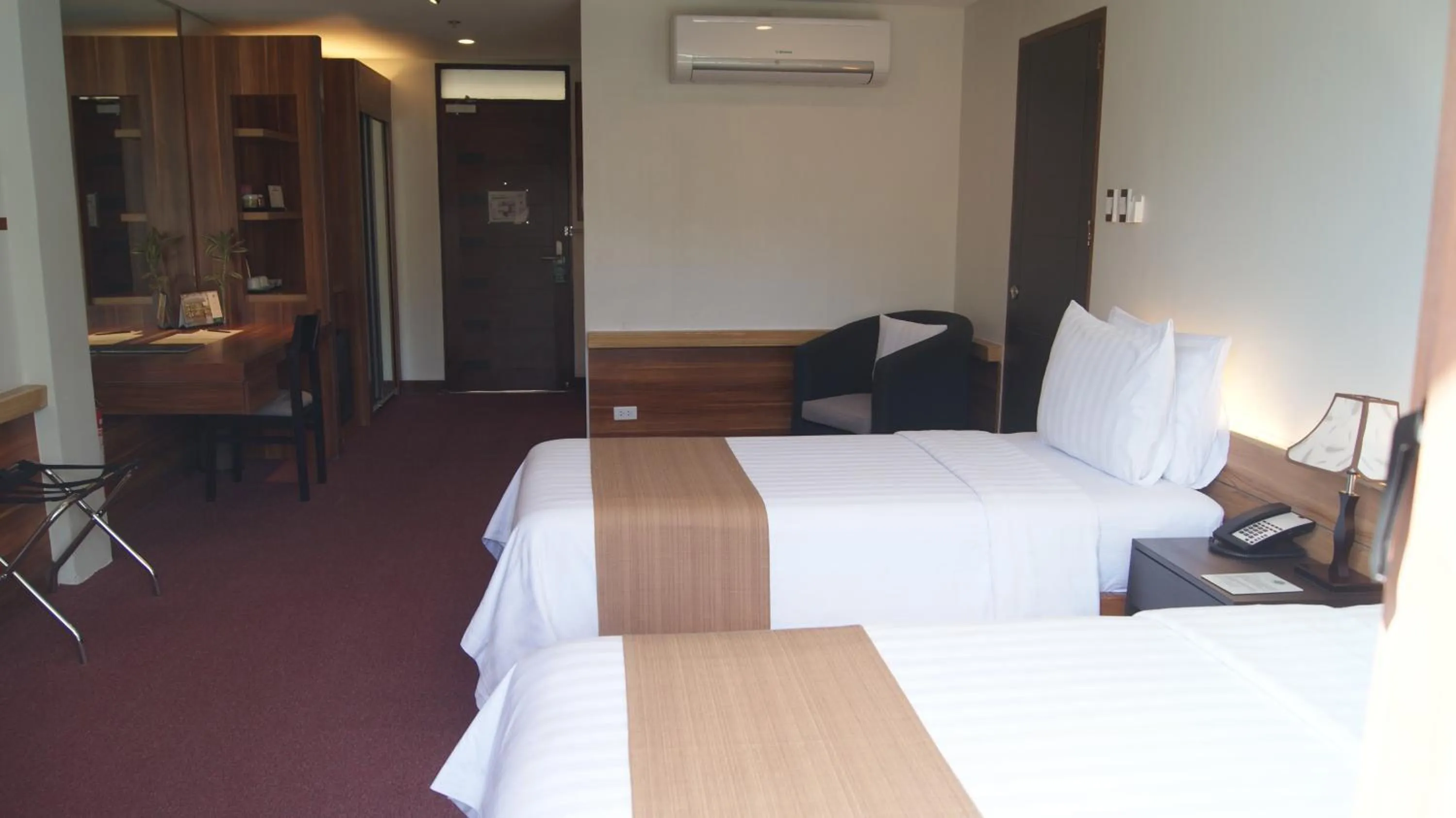 Bed in Grand Sierra Pines Baguio