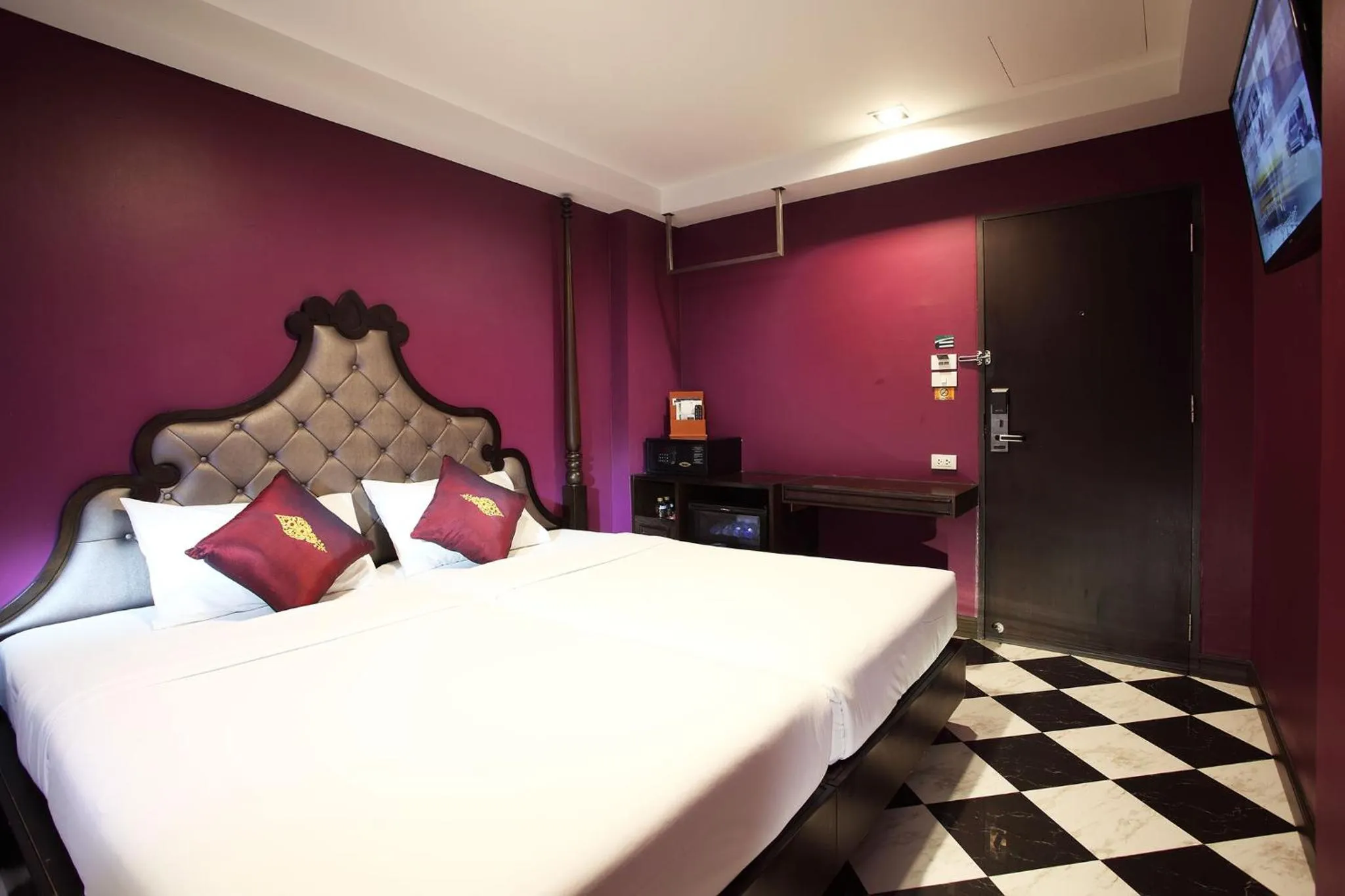 Bed in Violet Tower at Khaosan Palace