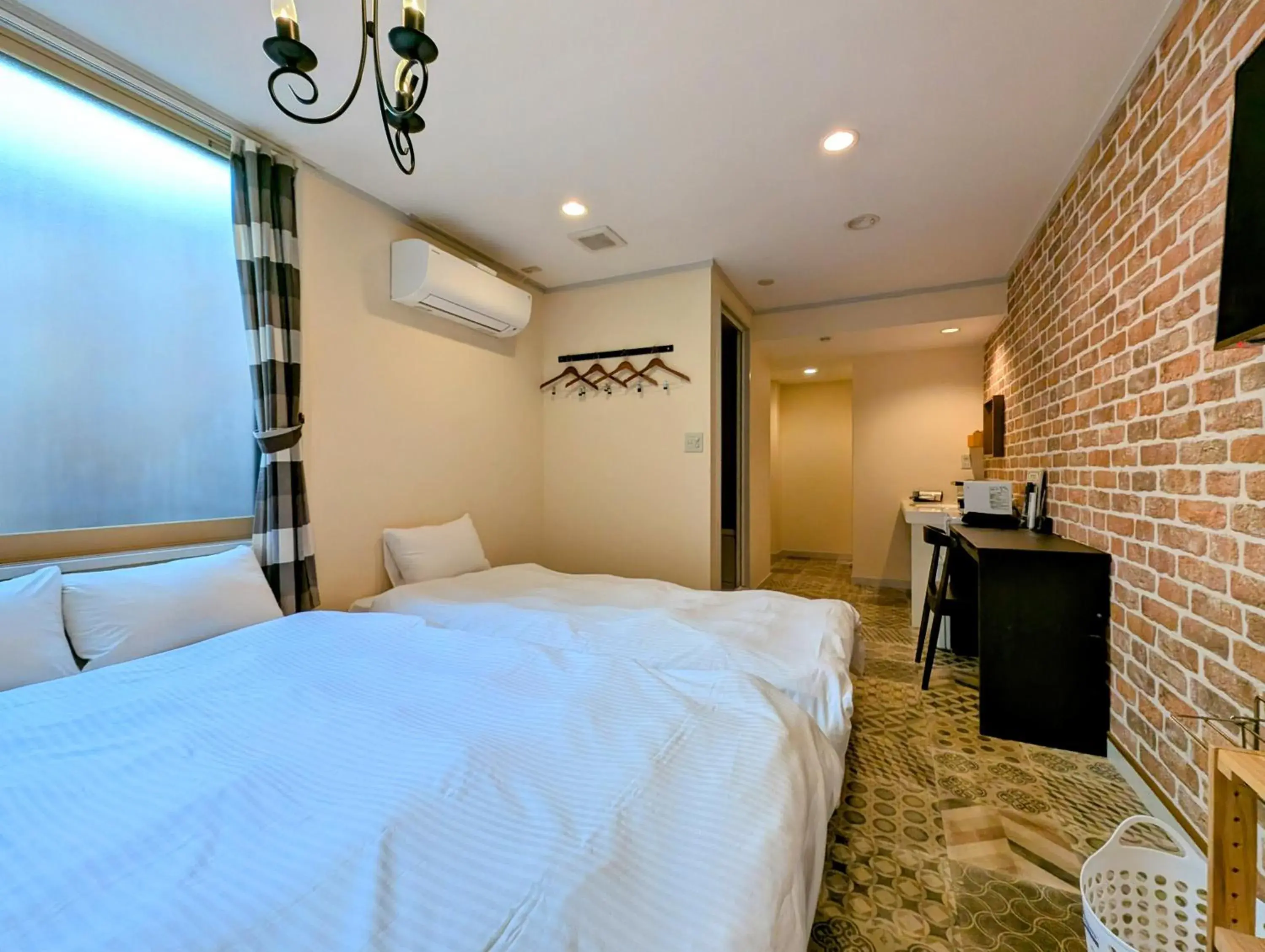 Moderate Room with One Single Bed and One Double Bed in Kanazawa Station Hotel Moderate Room with One Single Bed and One Double Bed in Kanazawa Station Hotel