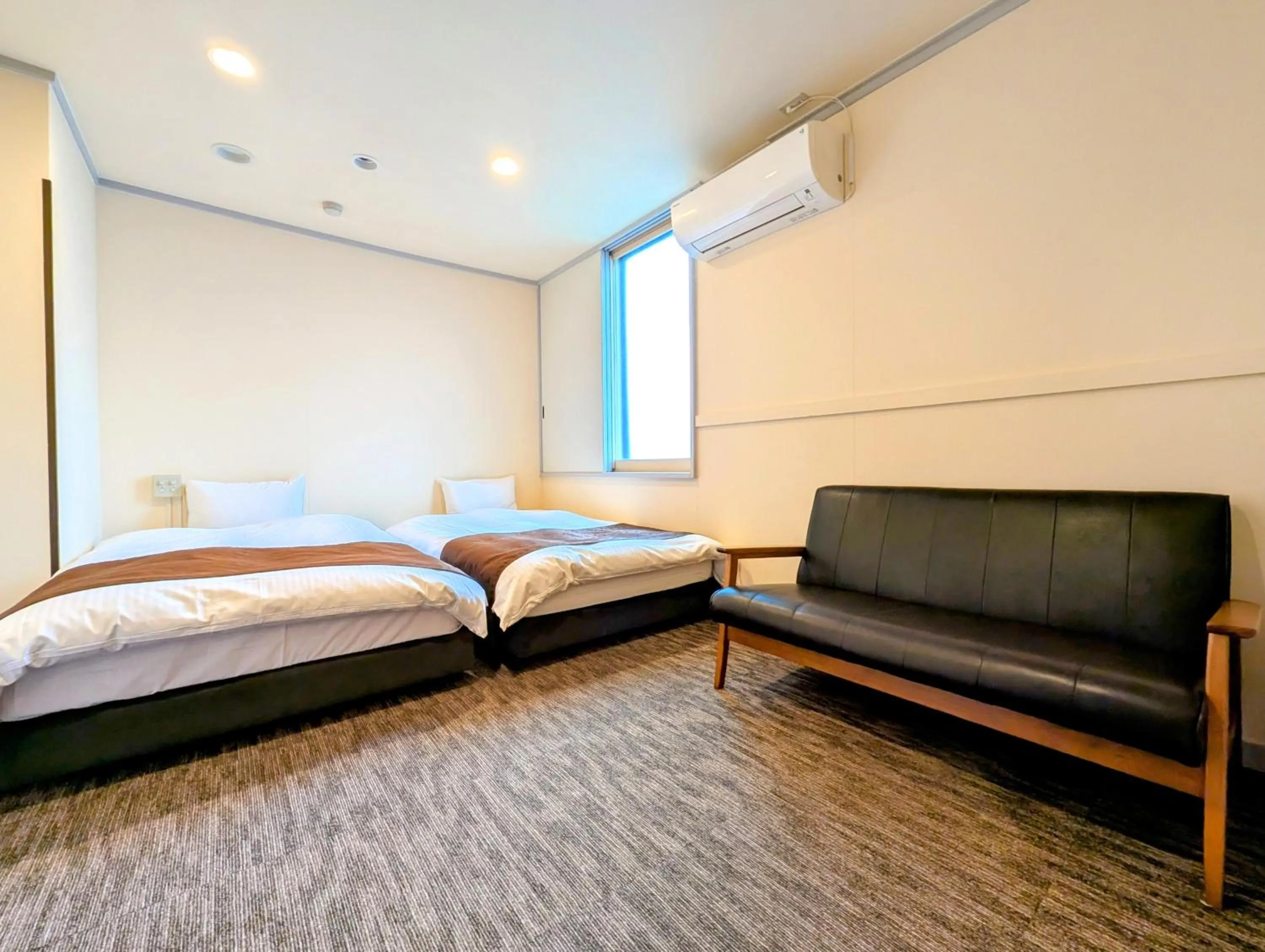 Photo of the whole room, Bed in Kanazawa Station Hotel