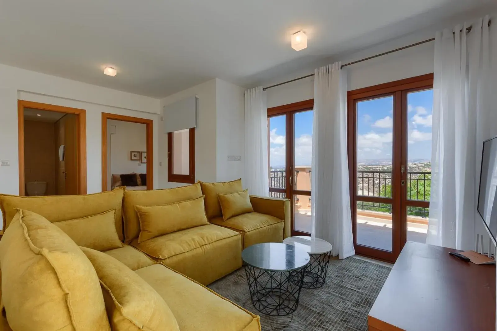 Living room in Aphrodite Hills Rentals - Apartments Living room in Aphrodite Hills Rentals - Apartments