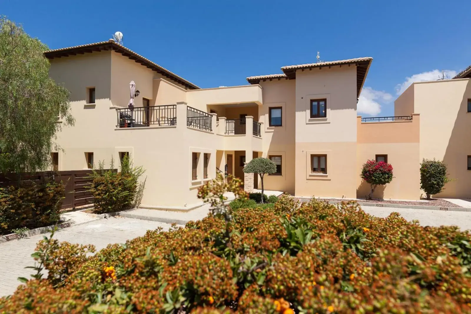 Property building in Aphrodite Hills Rentals - Apartments Property building in Aphrodite Hills Rentals - Apartments