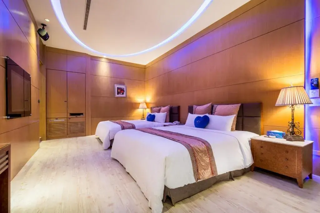 Bed in Blue Coast Spa Motel Bed in Blue Coast Spa Motel