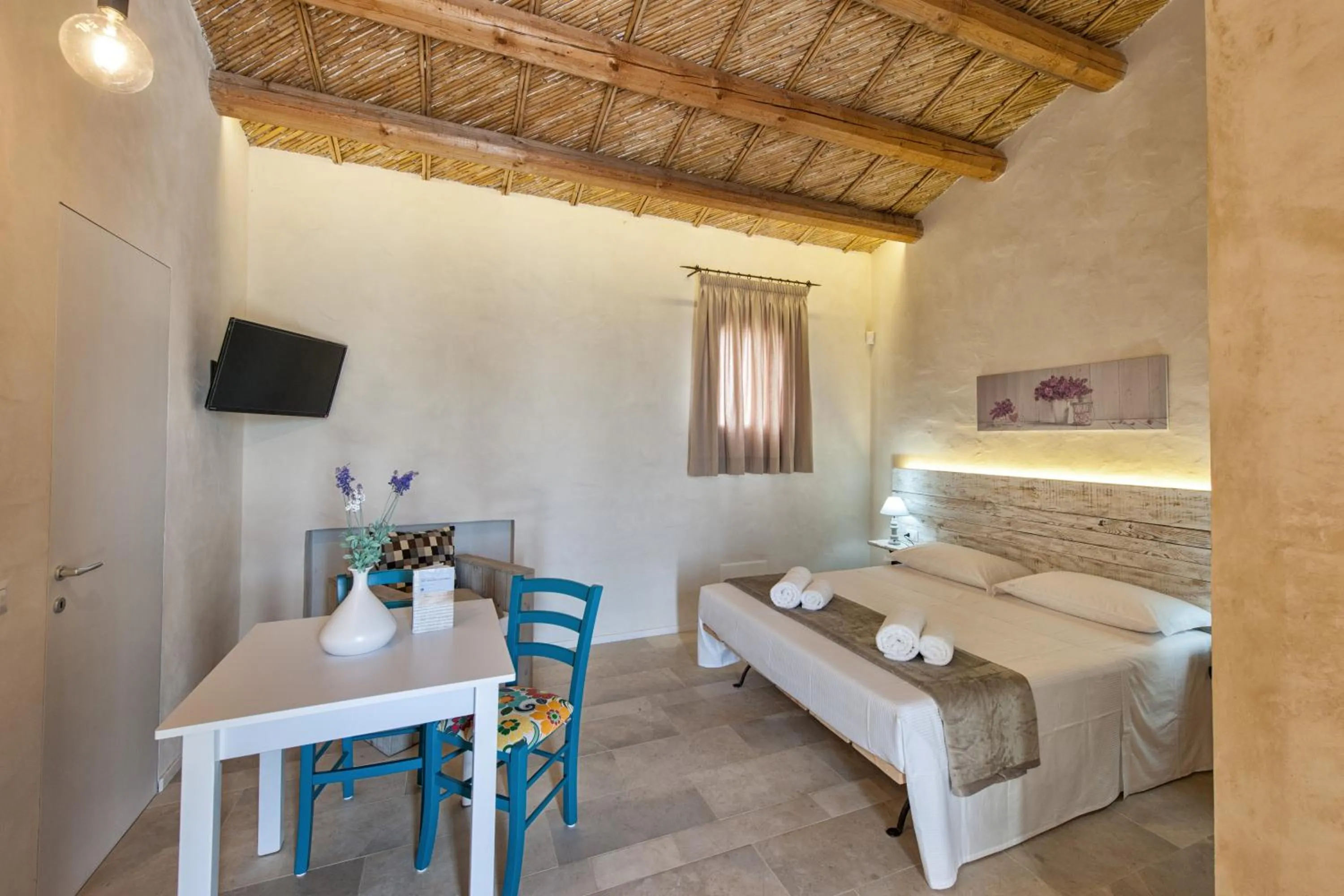 Bed in Stacci Rural Resort