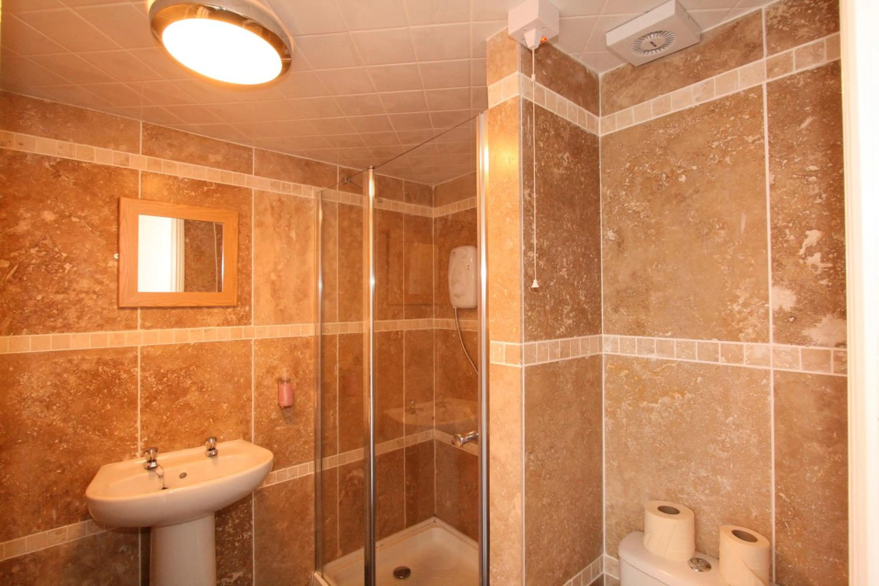 Bathroom in Central Studios Gloucester Road by RoomsBooked - Free Parking