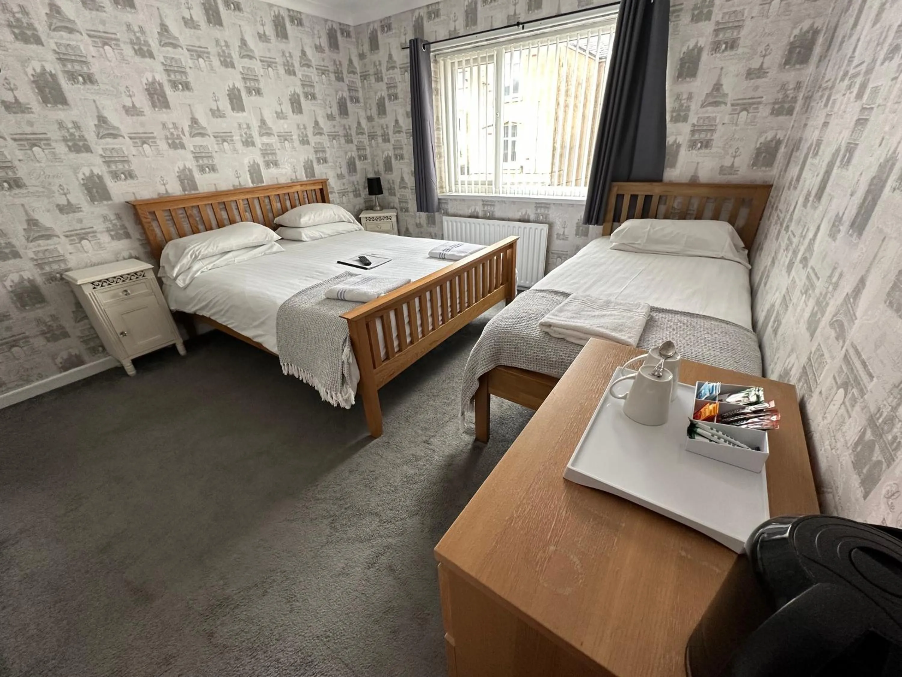 Bed in The Villa Hotel