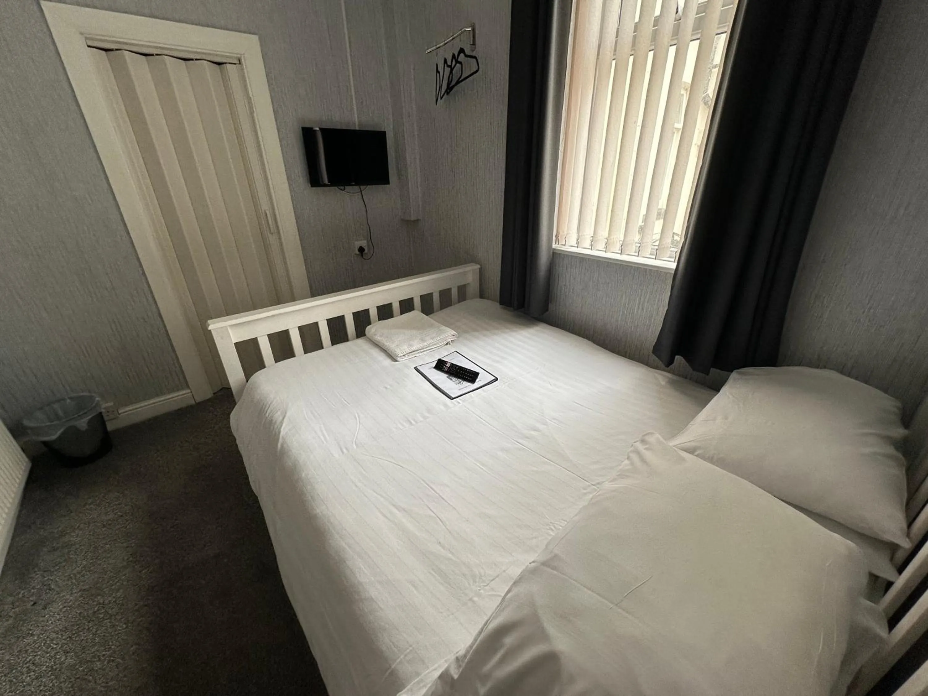 Bed in The Villa Hotel