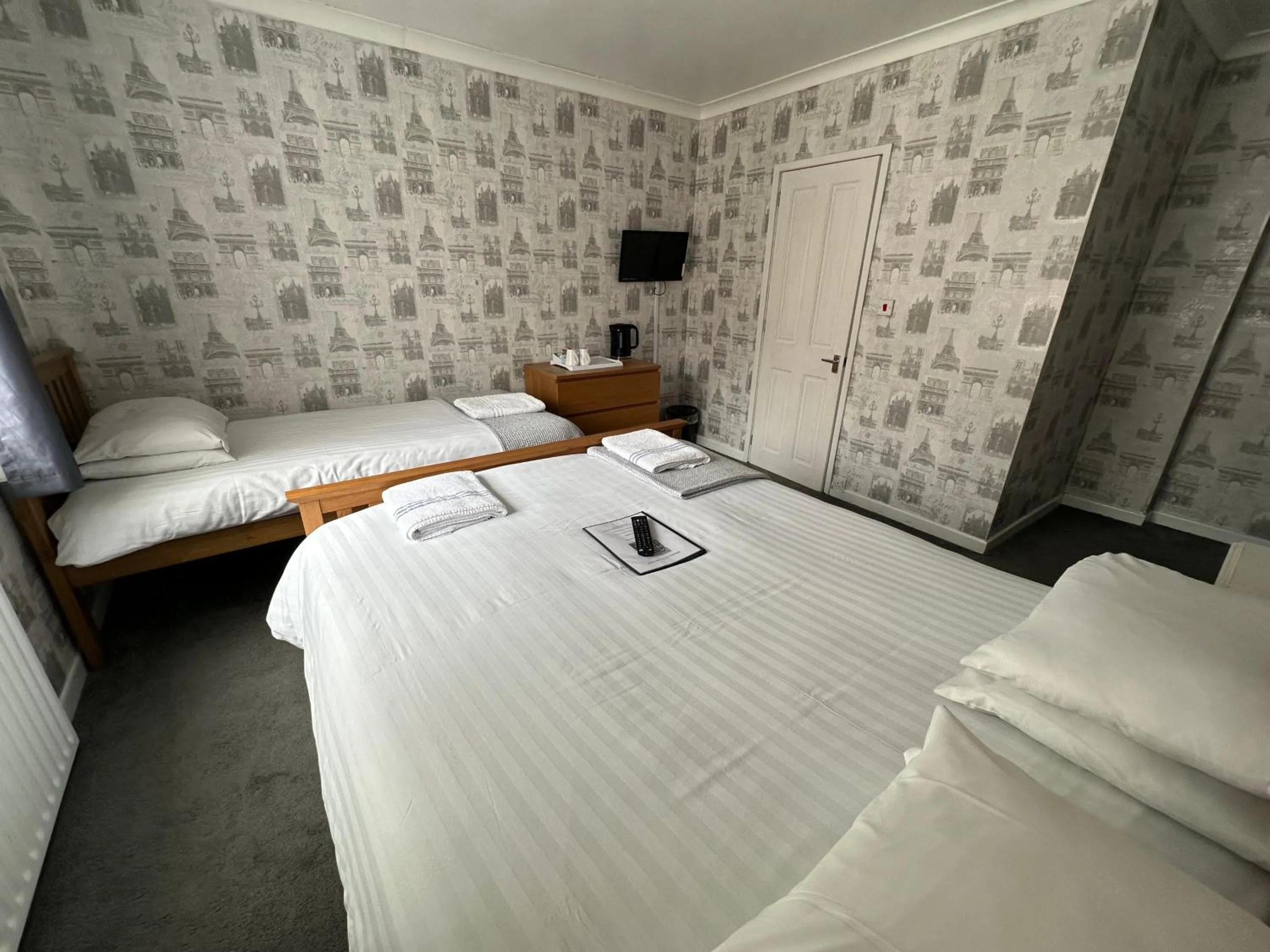 Bed in The Villa Hotel