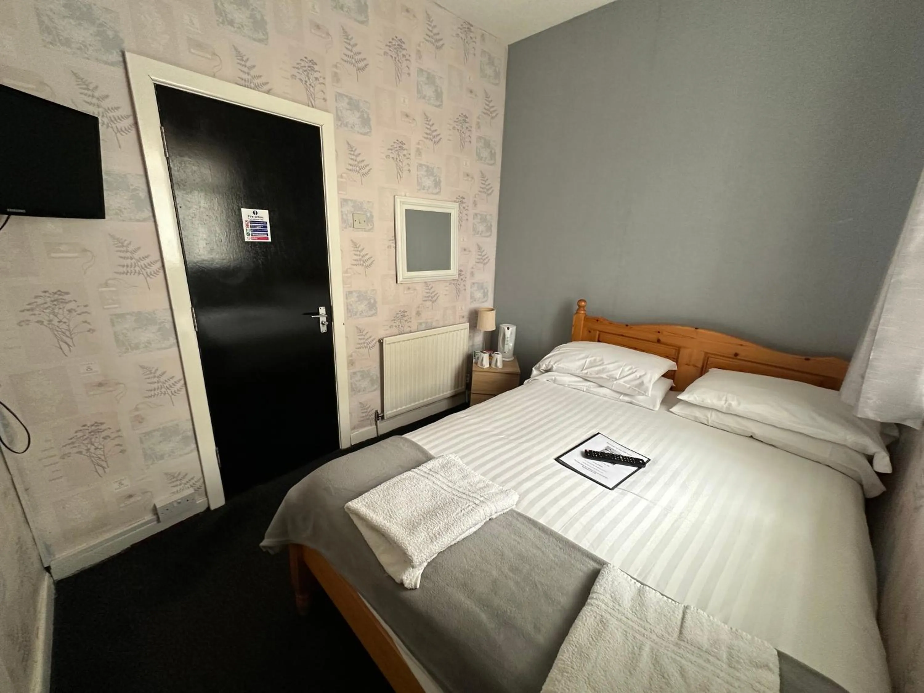 Bed in The Villa Hotel