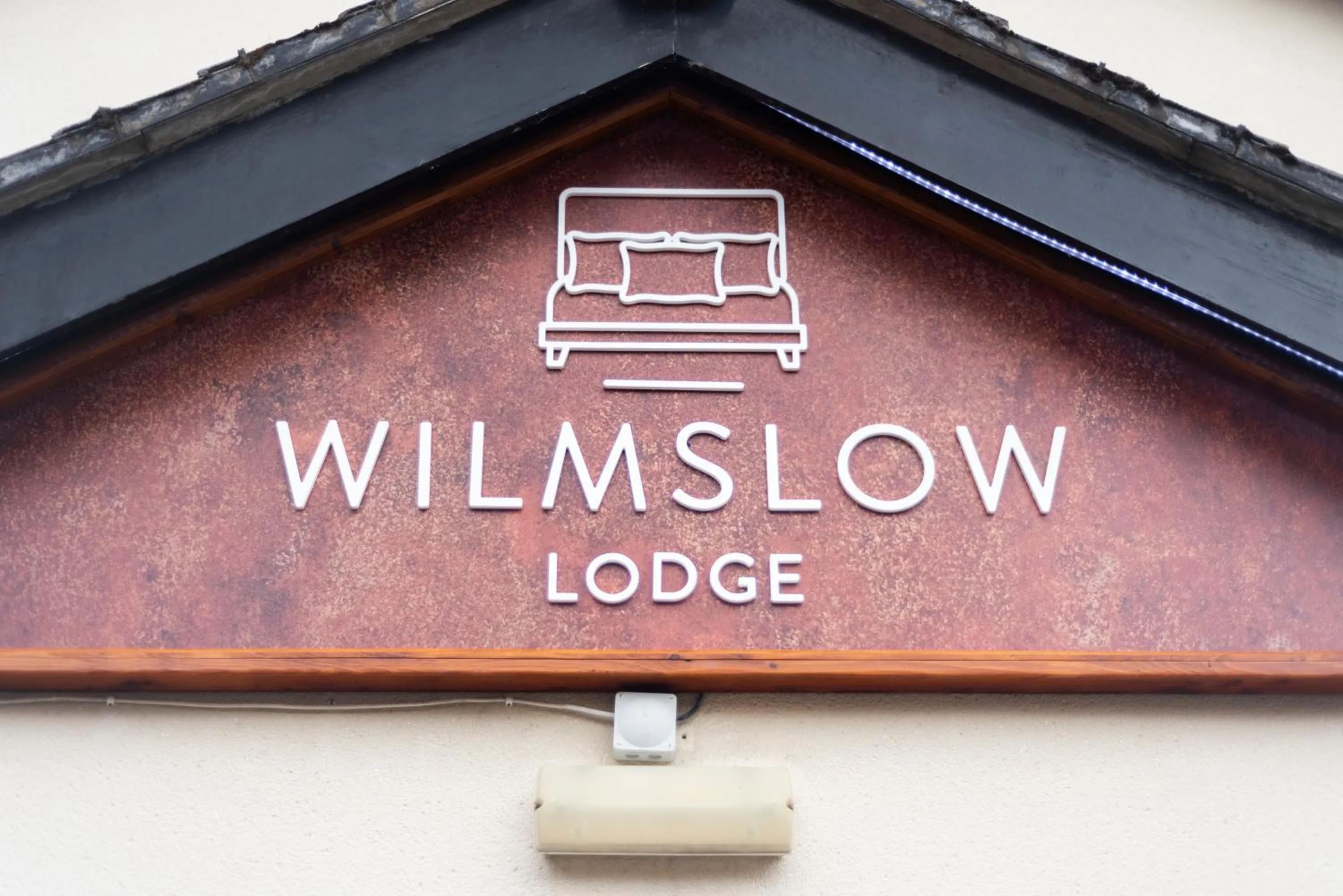 Property logo or sign in Wilmslow Lodge