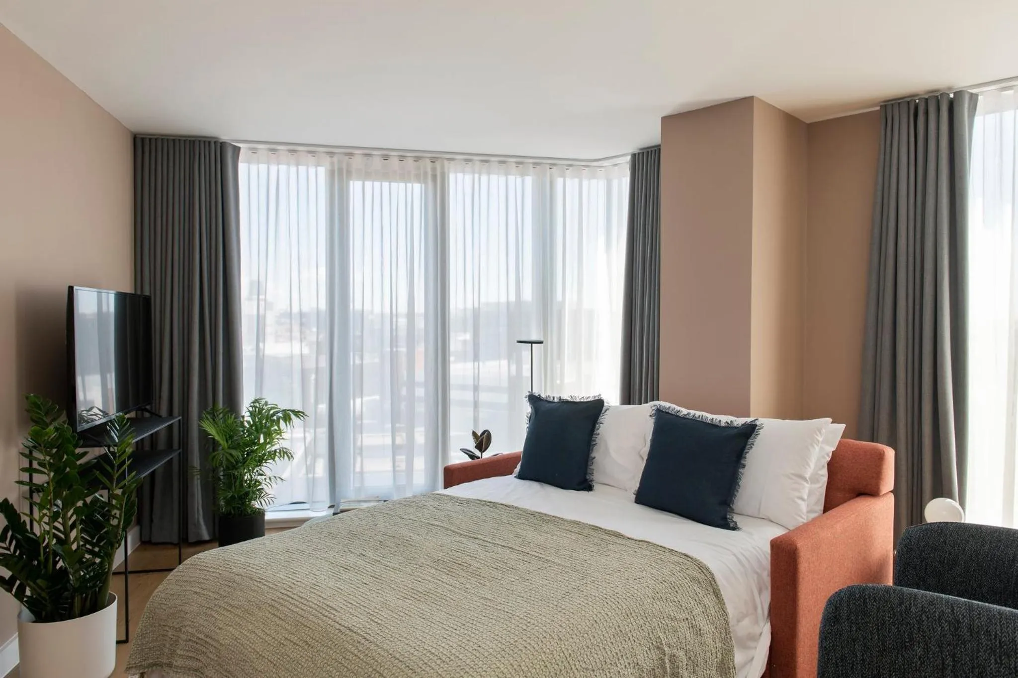 Living room, Bed in Cove Paradise Street