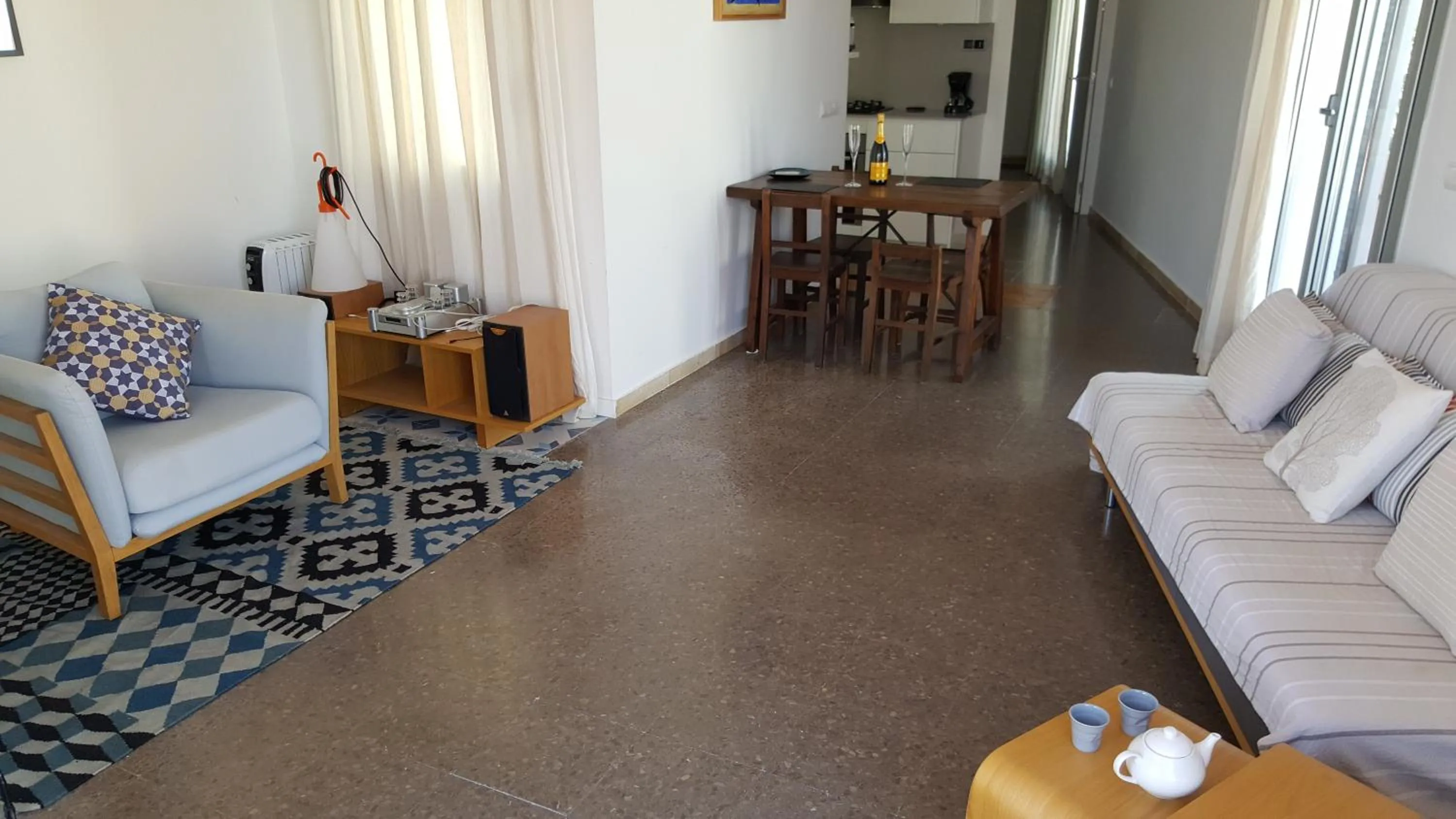 Communal lounge/ TV room in The Sky Attic Apartment