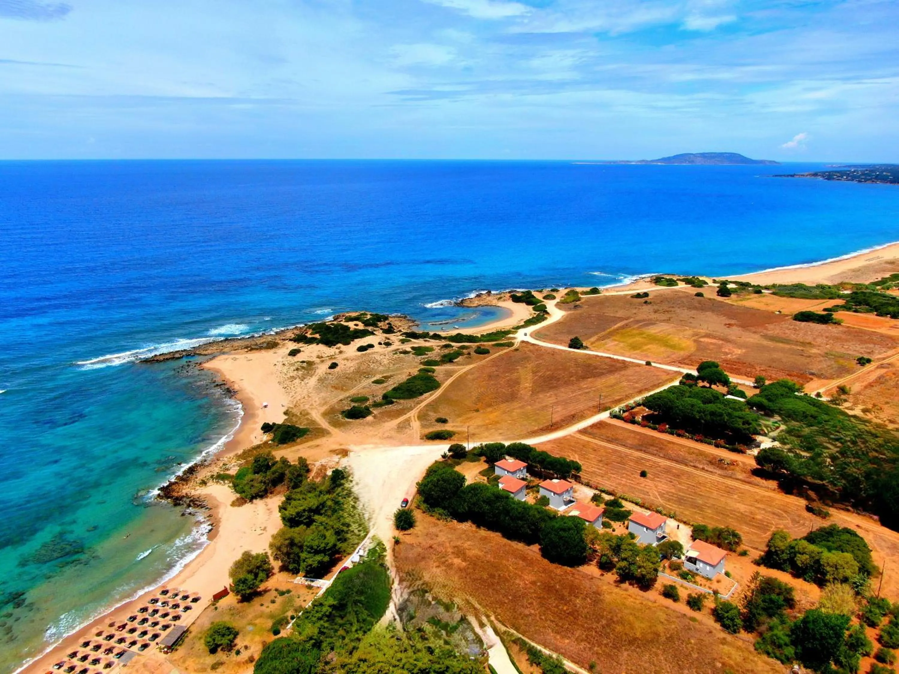 Property building in Romanos Beach Villas