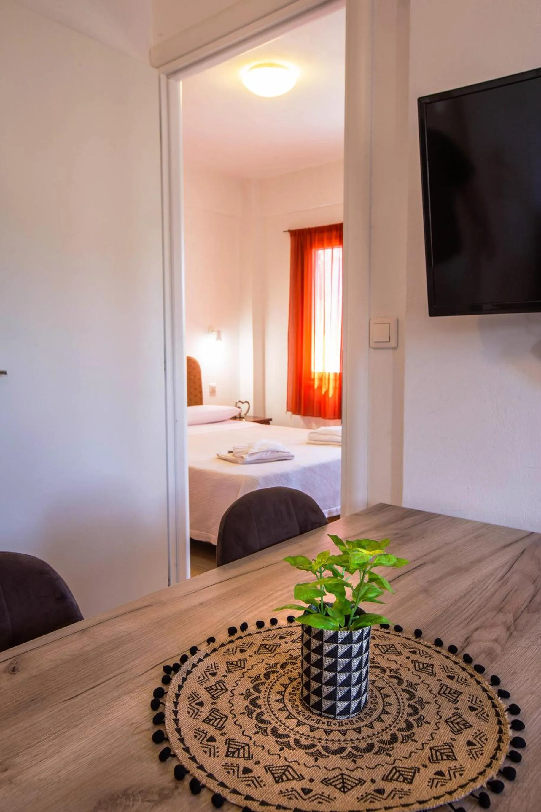 Bed in Romanos Beach Villas