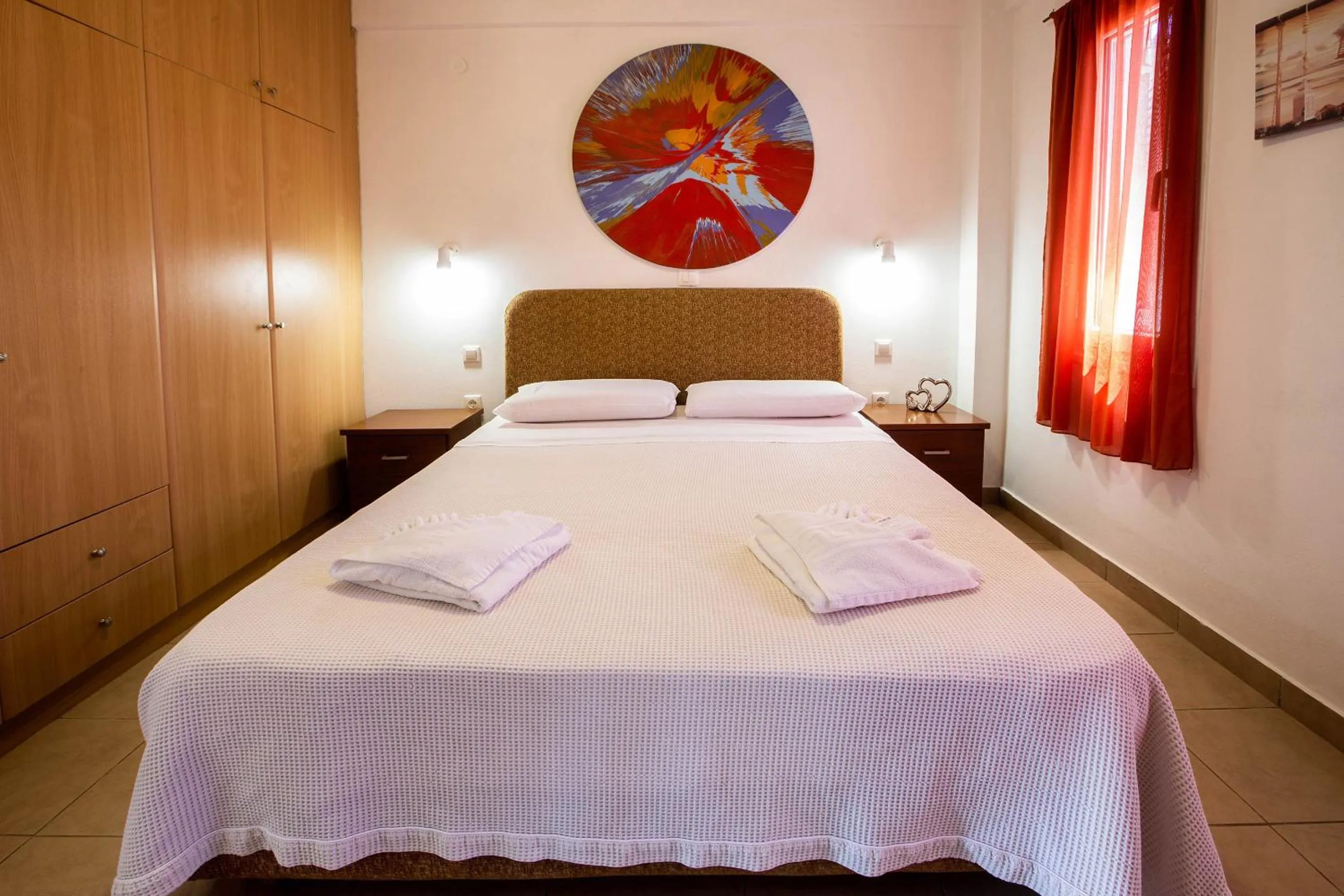 Bed in Romanos Beach Villas