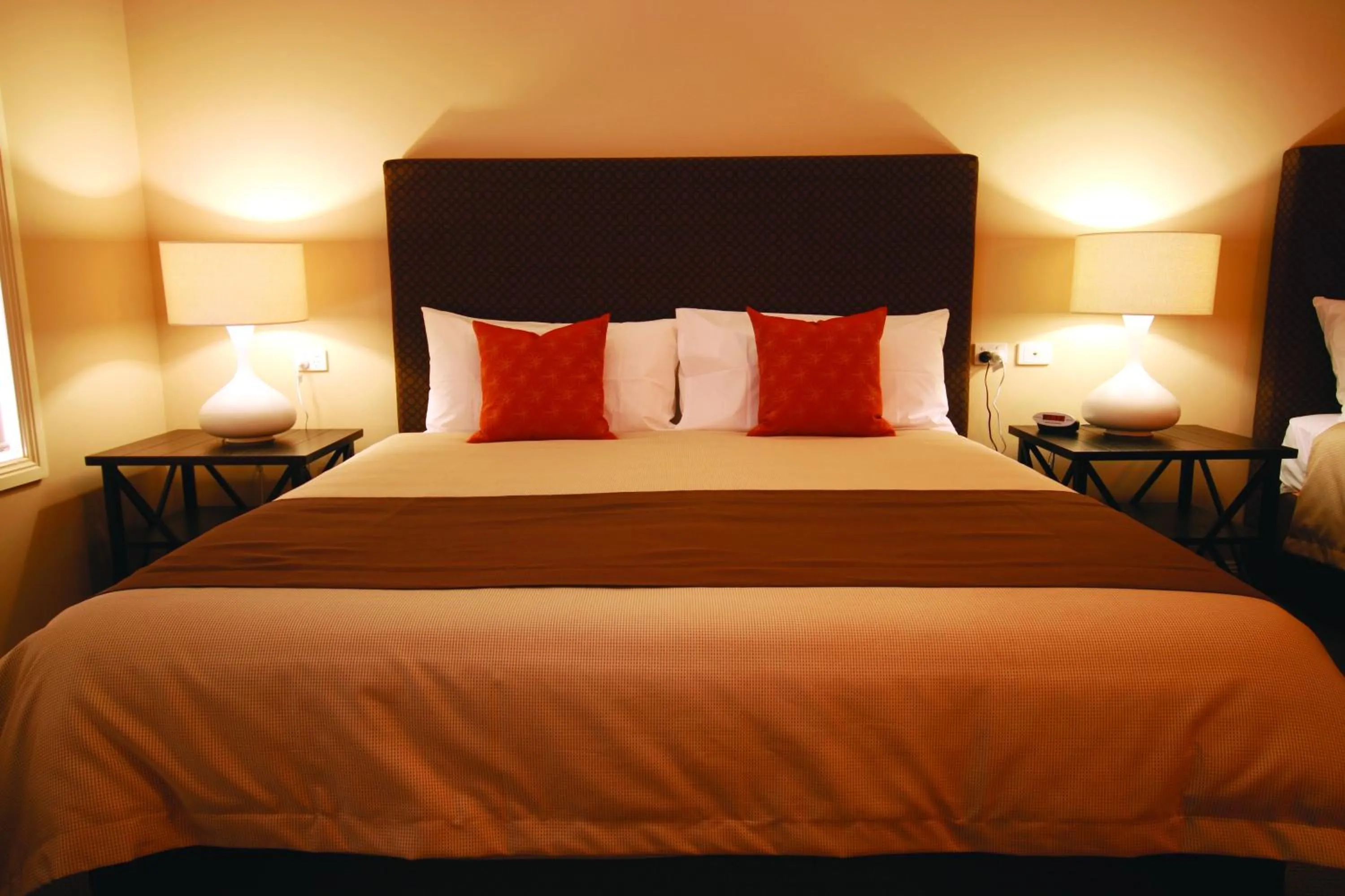 Bed in Sundowner Motel Hotel