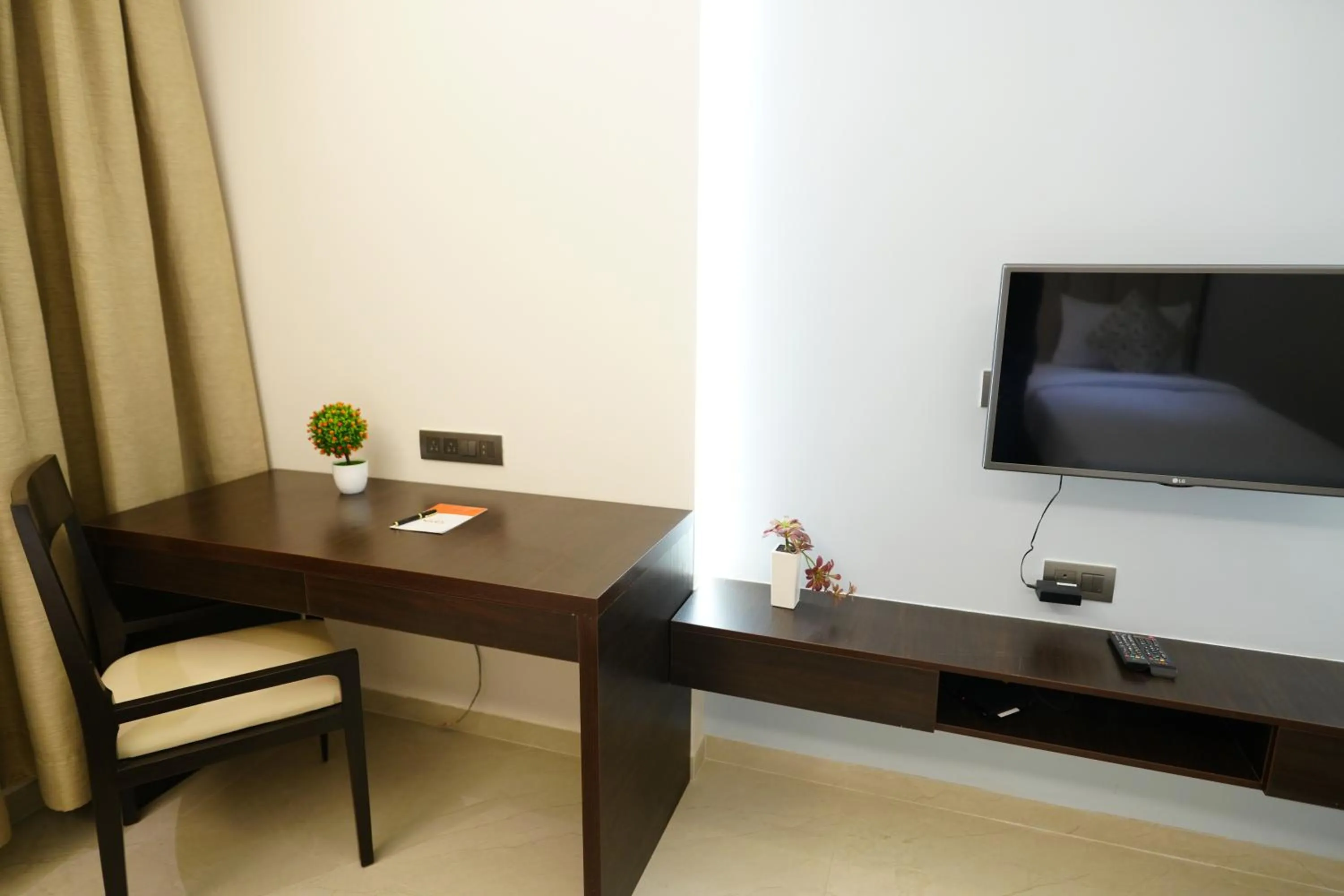 Bedroom in Hotel Grand Visava Lonavala