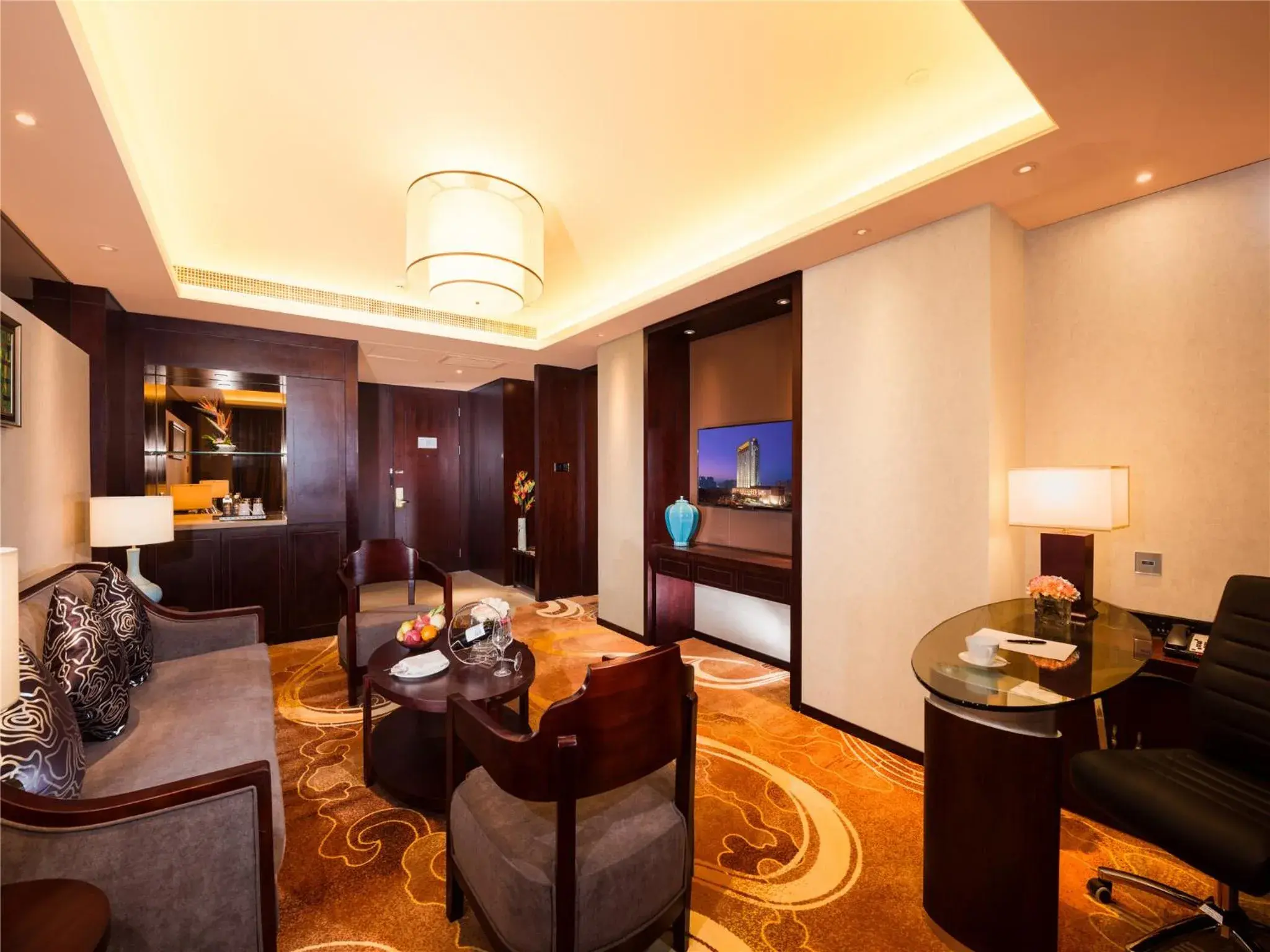 Living room in New Century Grand Hotel Living room in New Century Grand Hotel