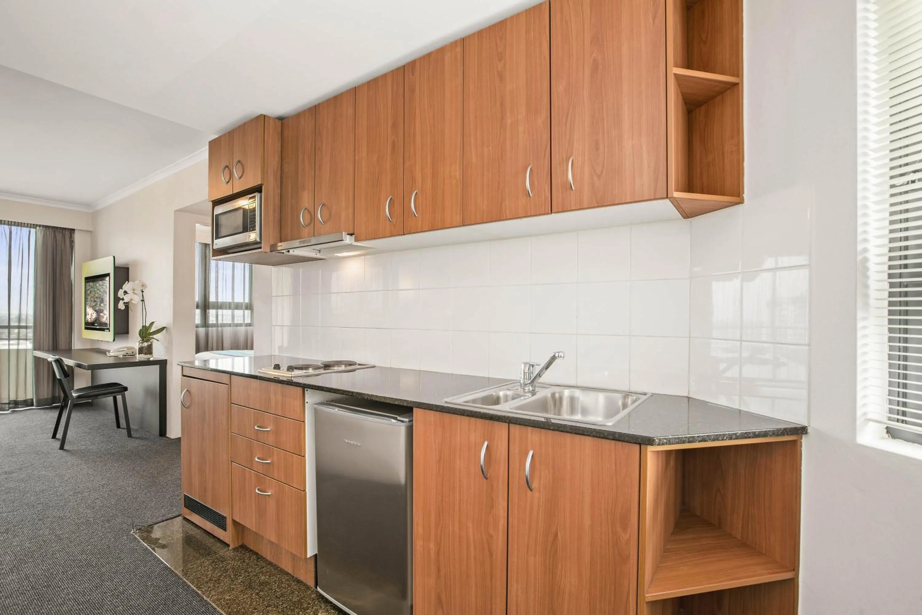 Kitchen or kitchenette in Mantra Parramatta