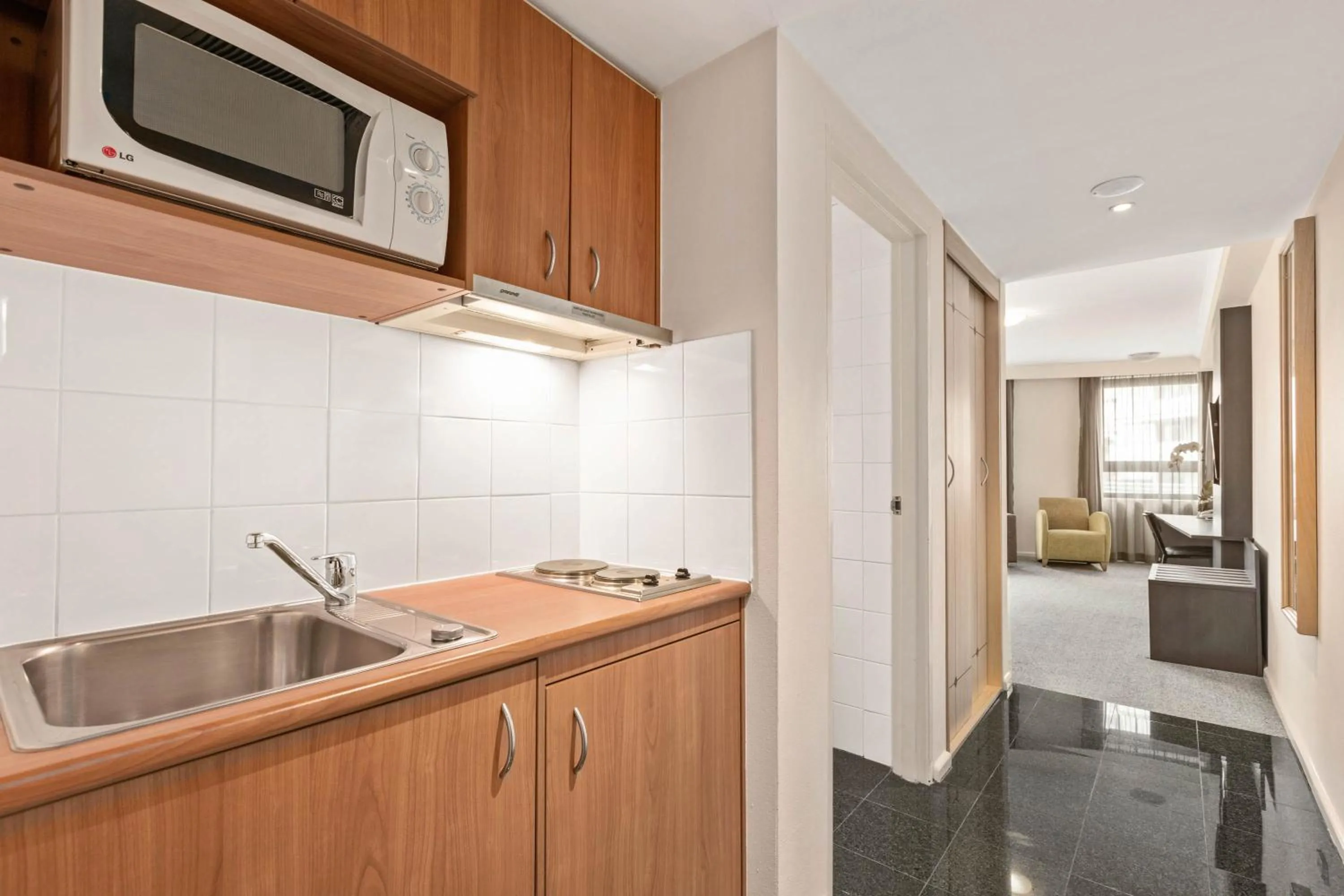 Kitchen or kitchenette in Mantra Parramatta