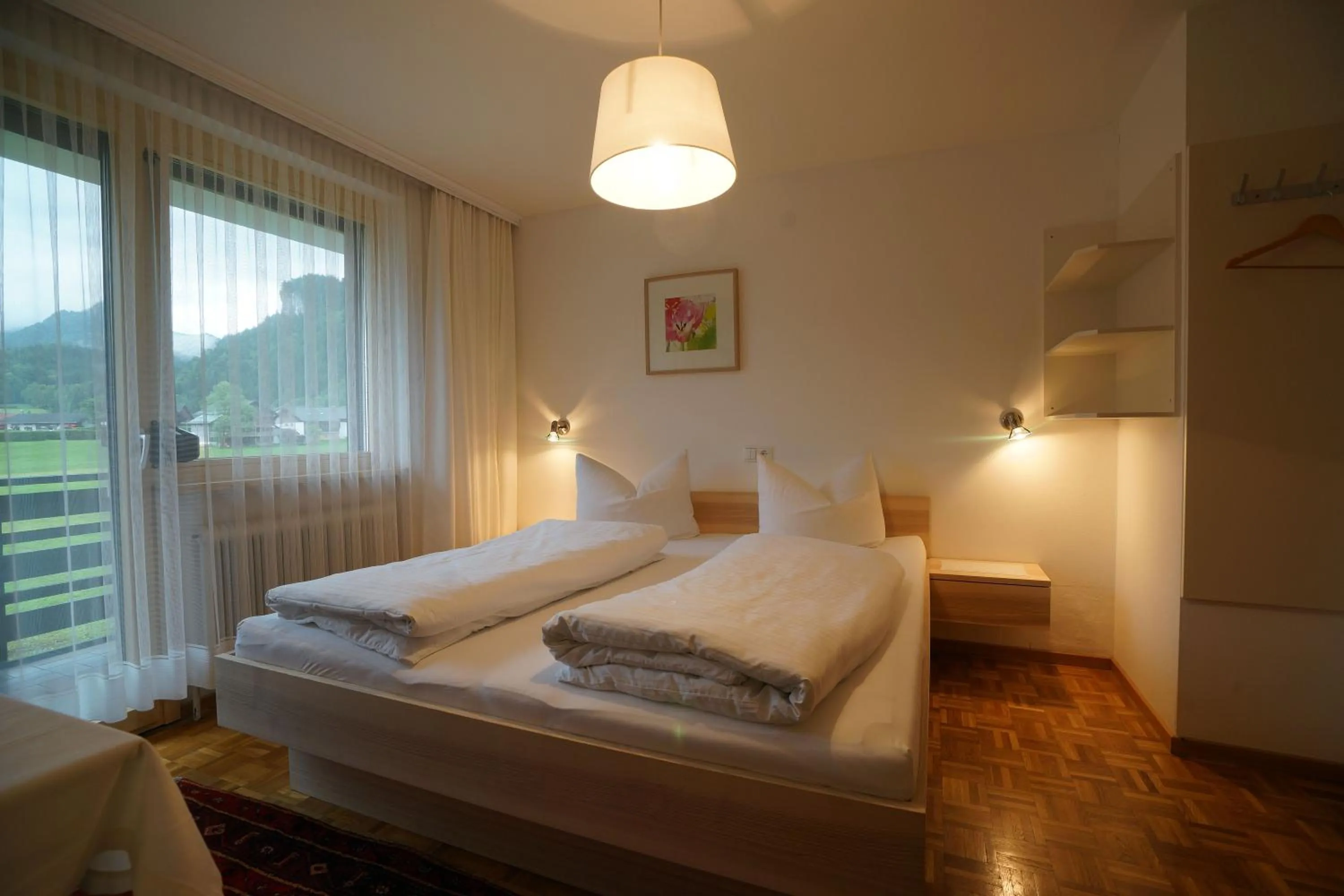 Photo of the whole room, Bed in Gästehaus Meusburger