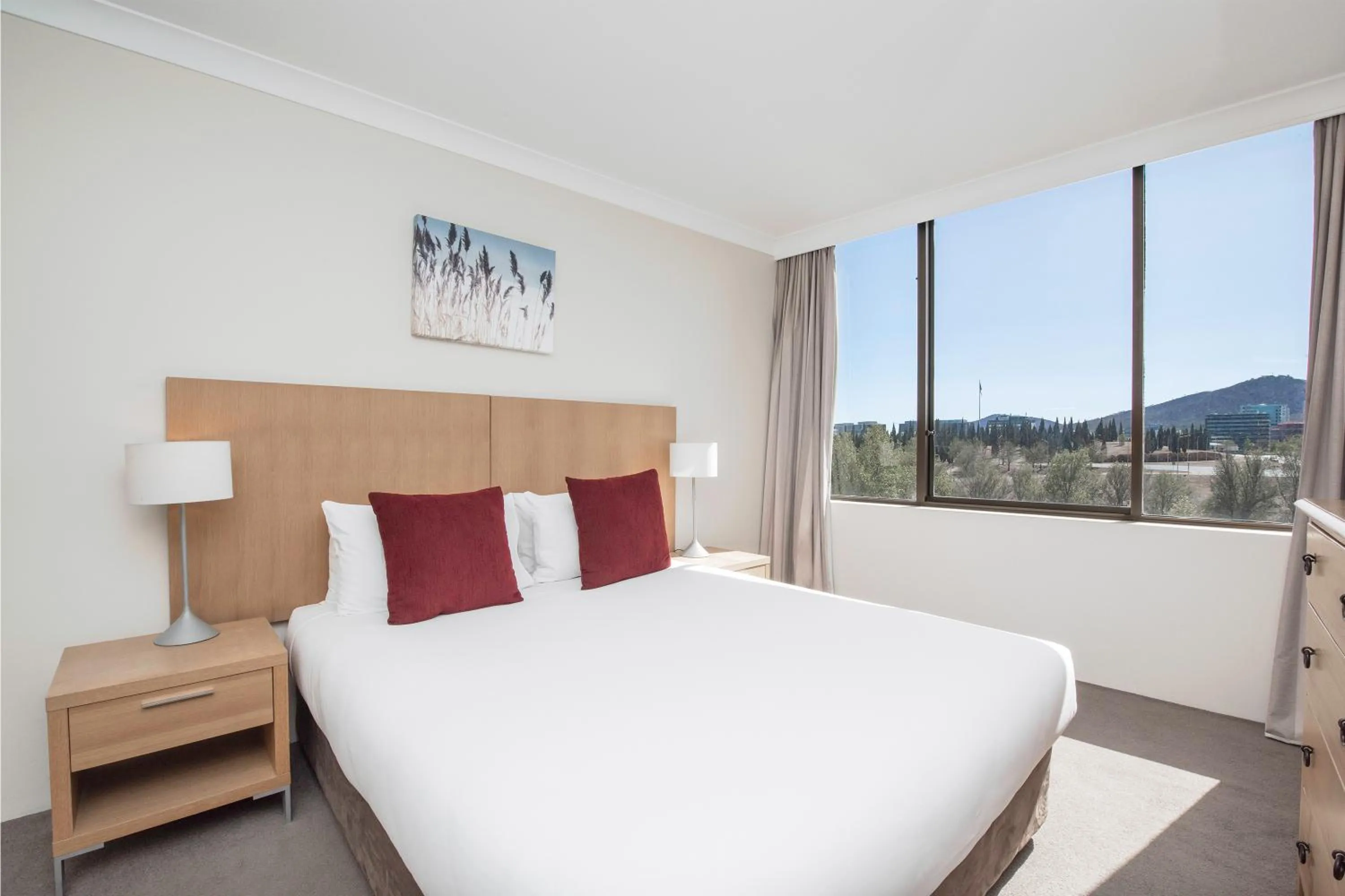 Bedroom, Bed in BreakFree Capital Tower Apartments