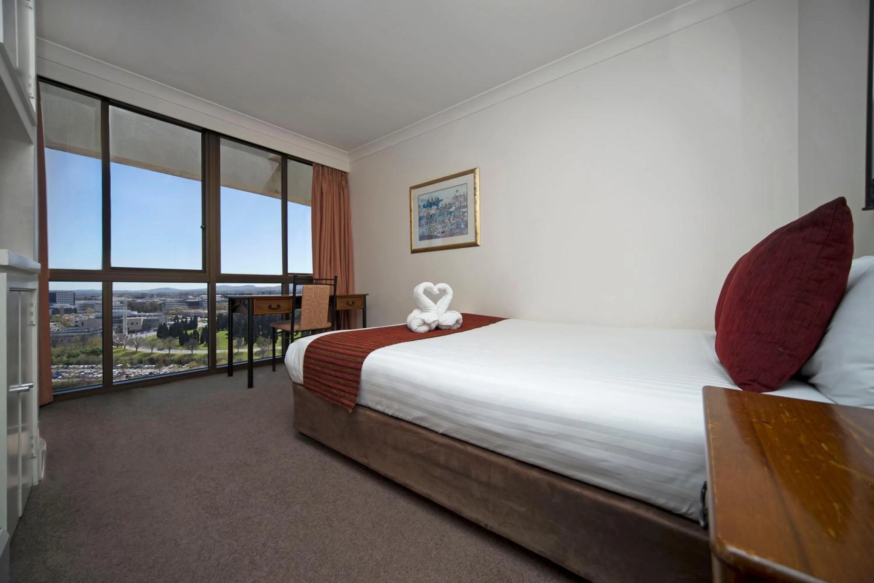 Bedroom, Bed in BreakFree Capital Tower Apartments