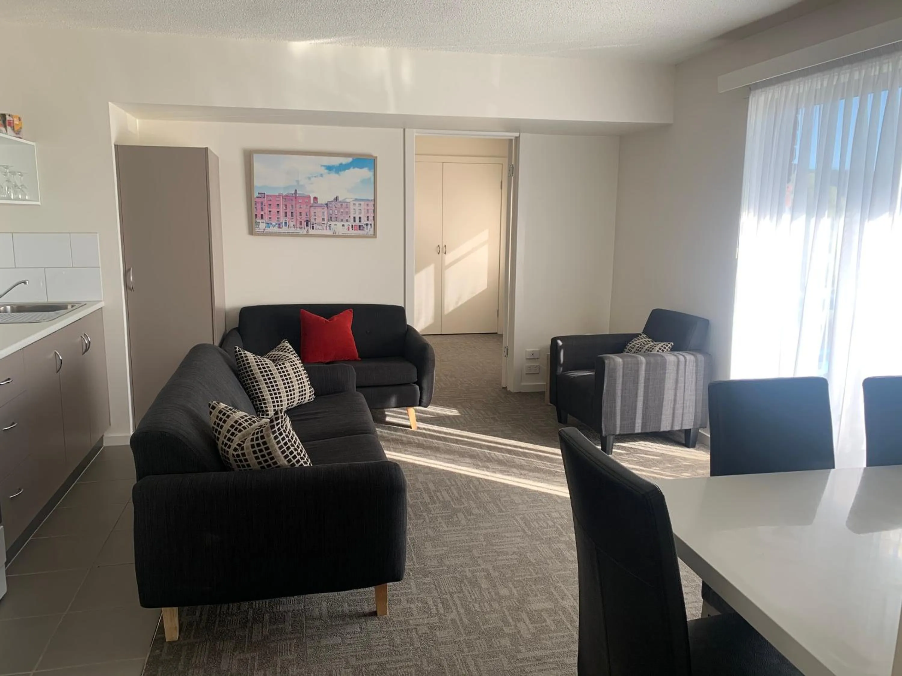 Living room in Adina Place Motel Apartments