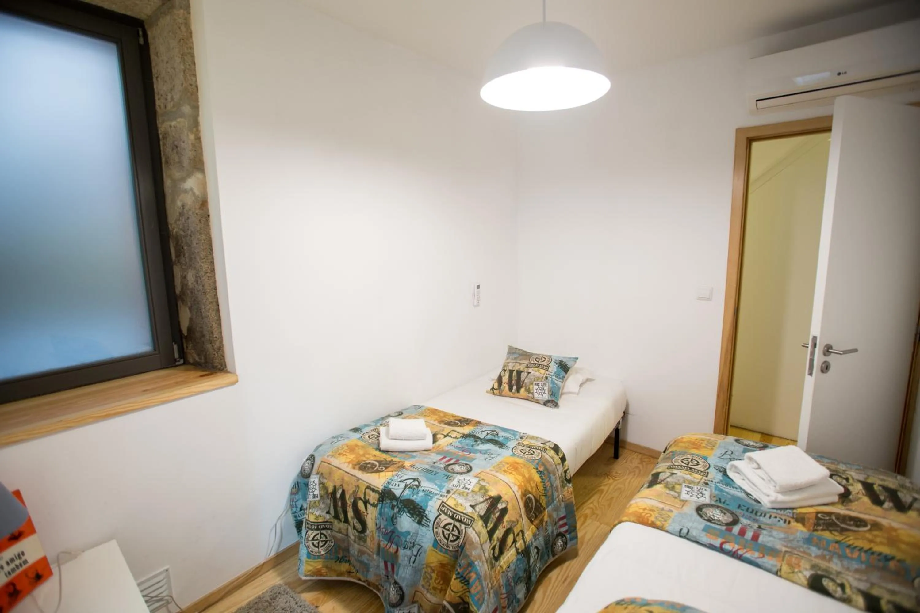 Bed in LivingPorto Apartments by Porto City Hosts