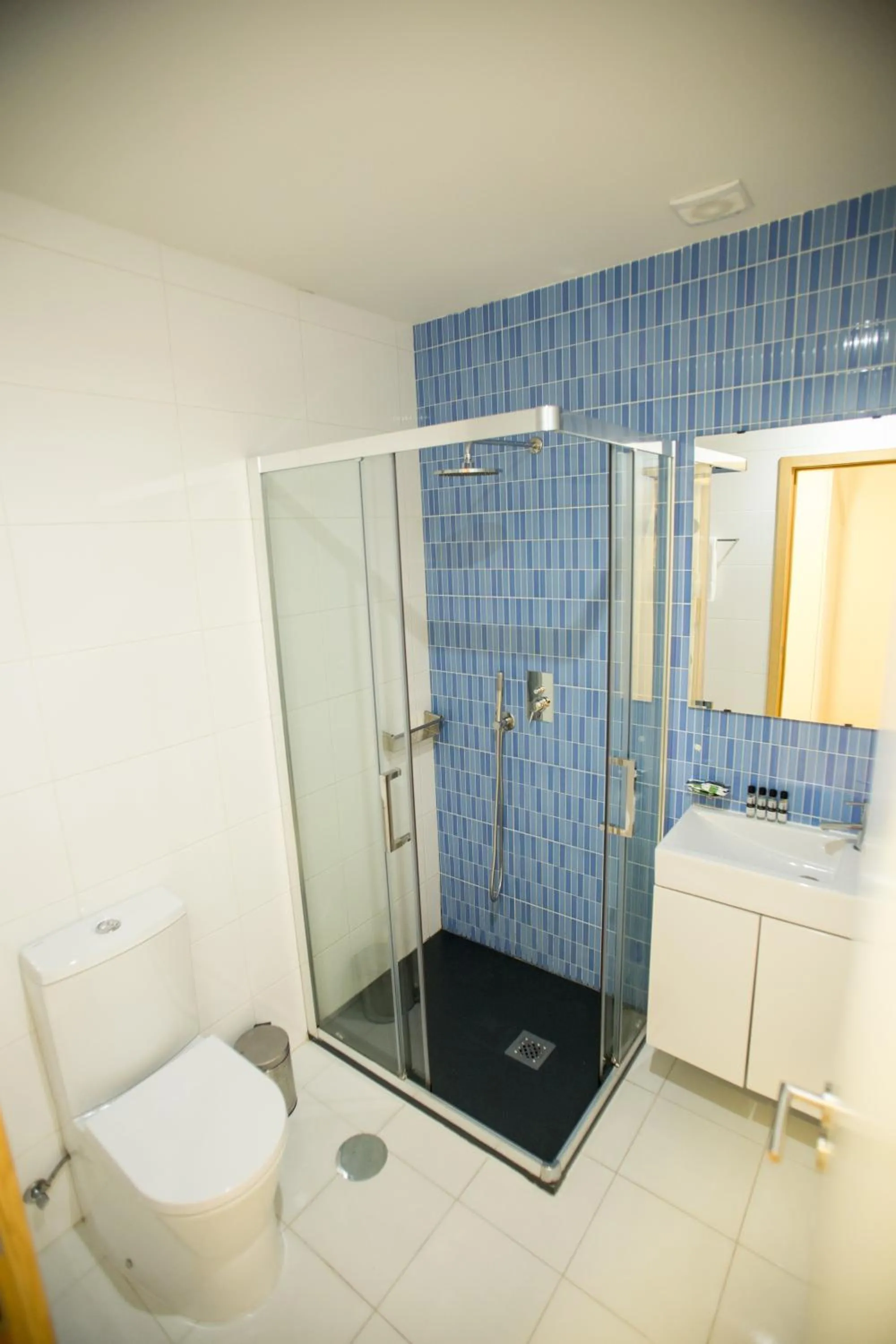 Shower in LivingPorto Apartments by Porto City Hosts