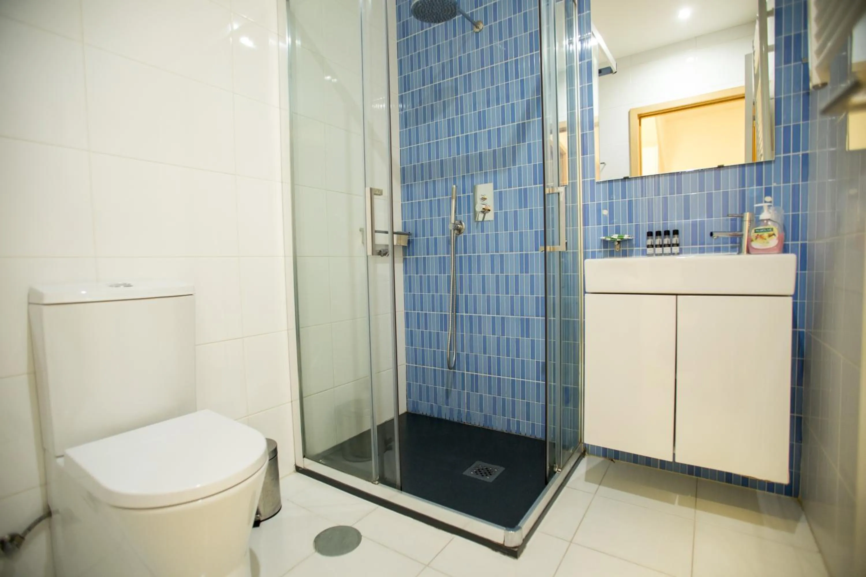 Shower in LivingPorto Apartments by Porto City Hosts