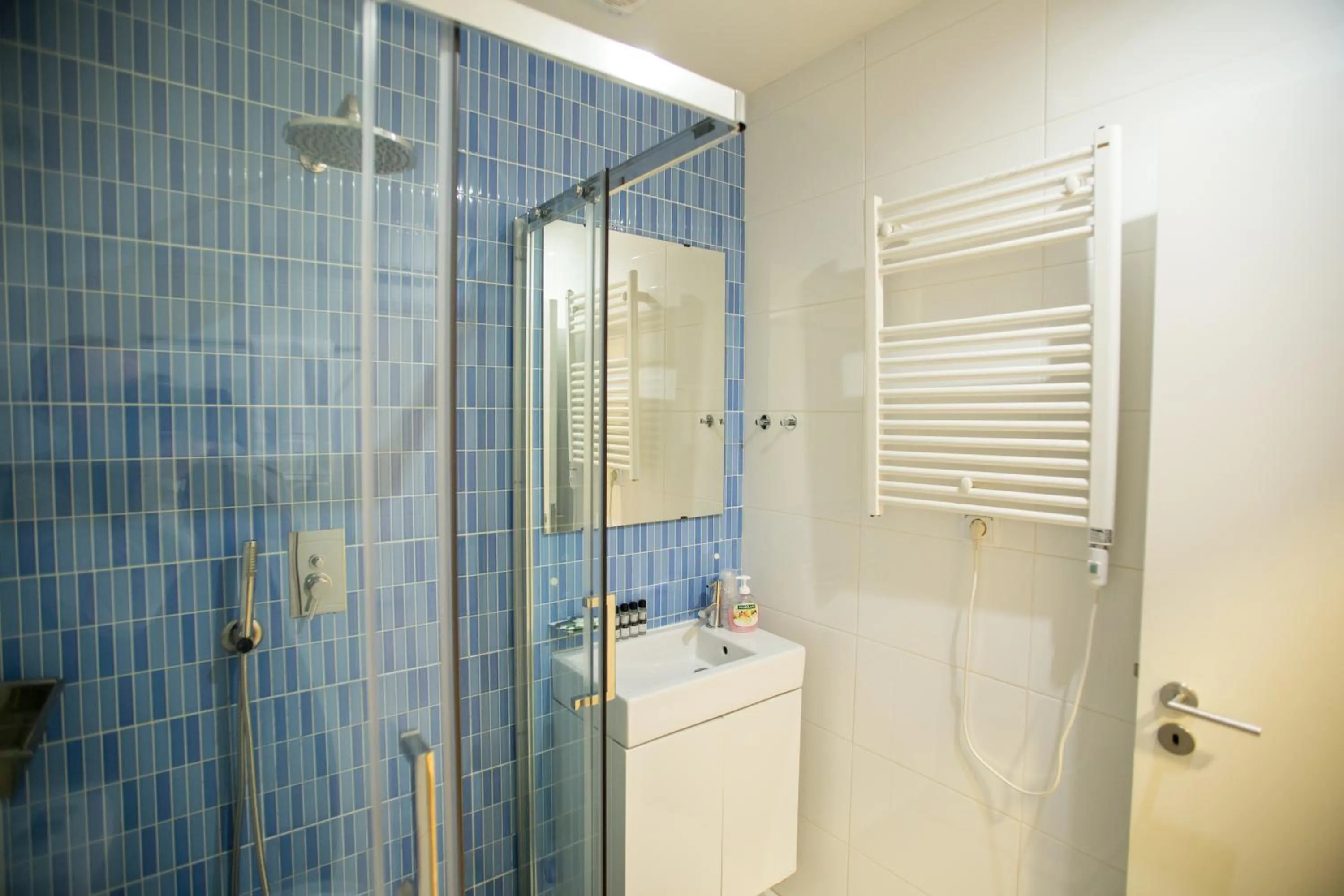 Shower in LivingPorto Apartments by Porto City Hosts