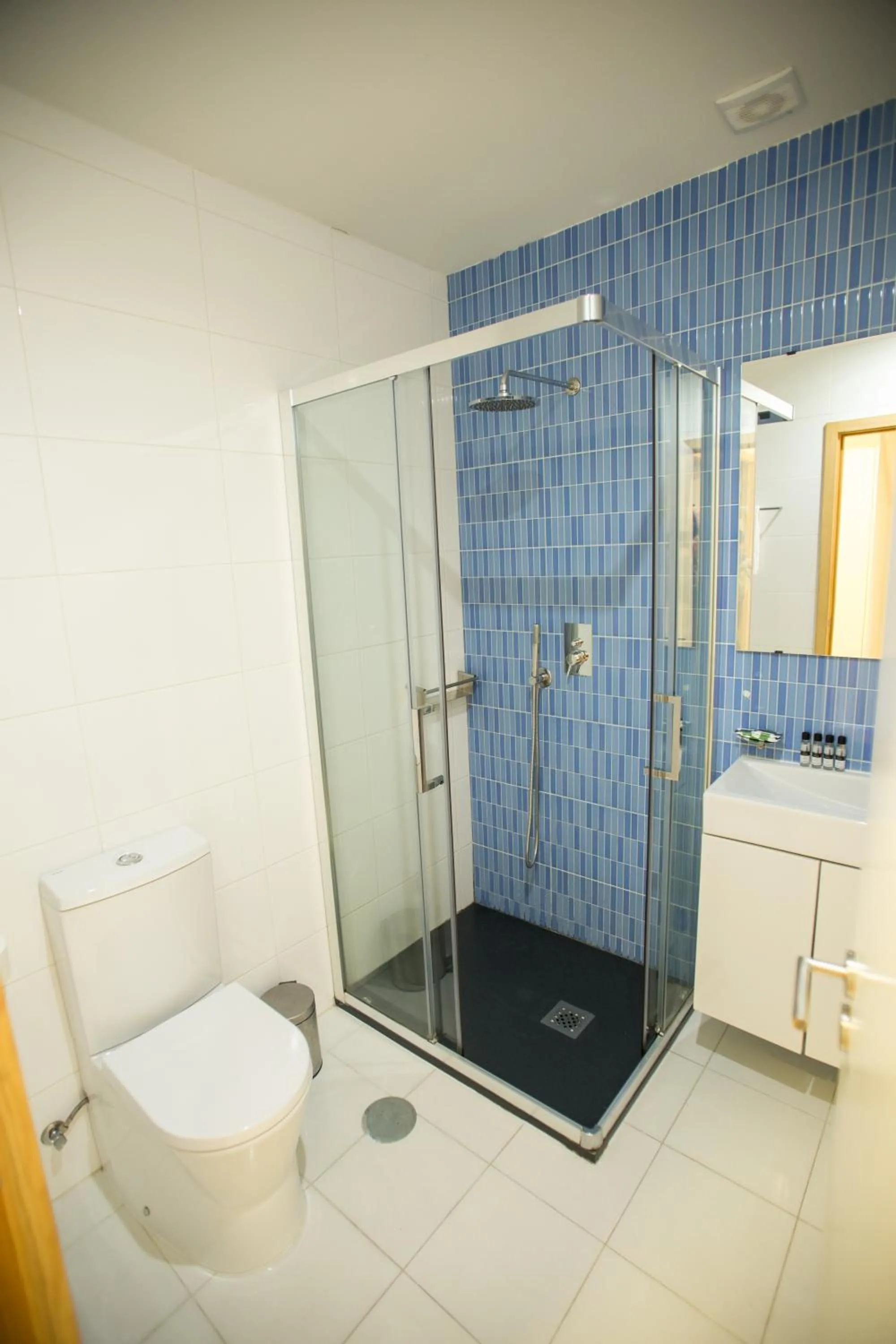 Shower in LivingPorto Apartments by Porto City Hosts