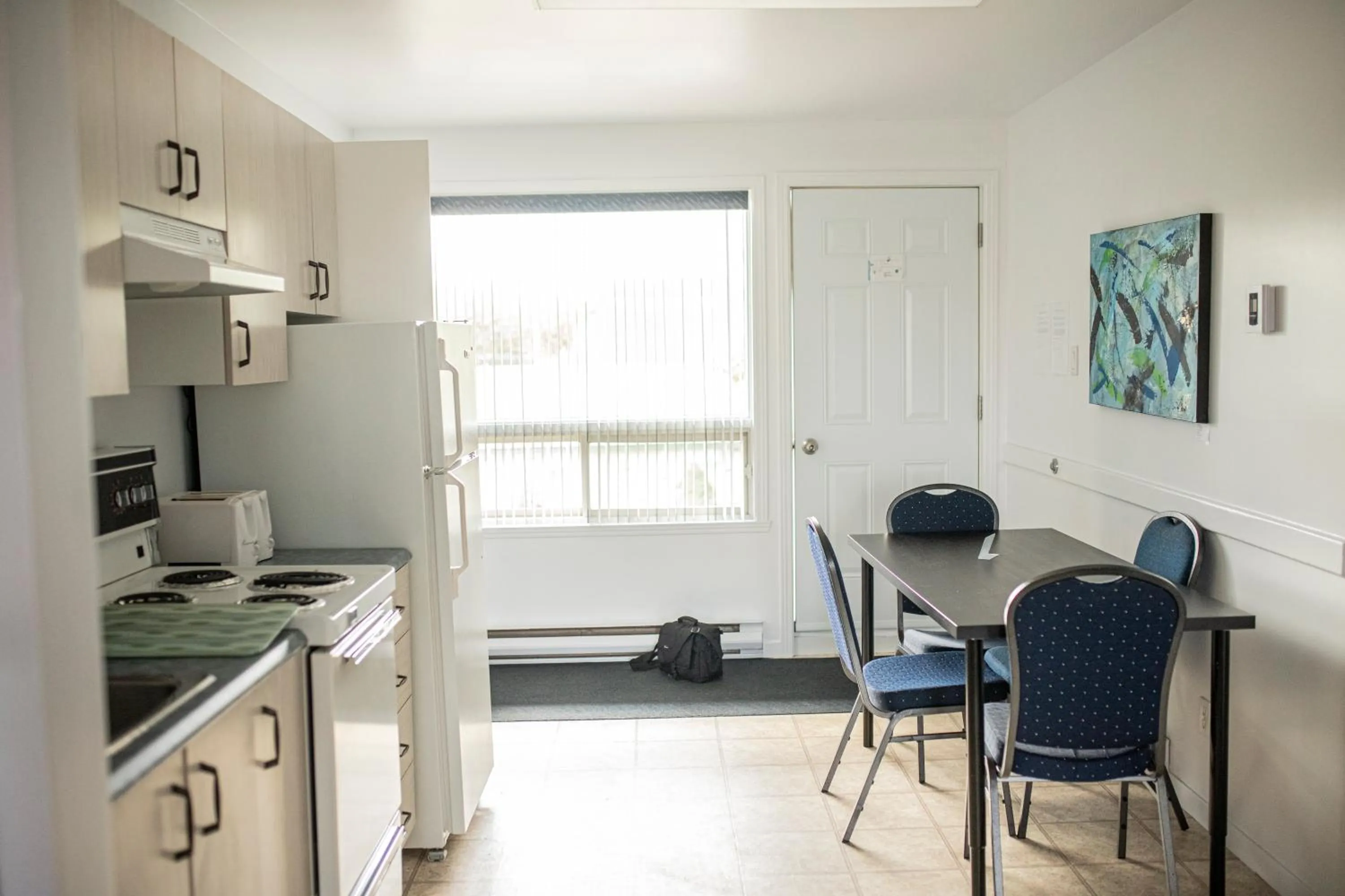 Kitchen or kitchenette in Motel Et Condo Chez Charley