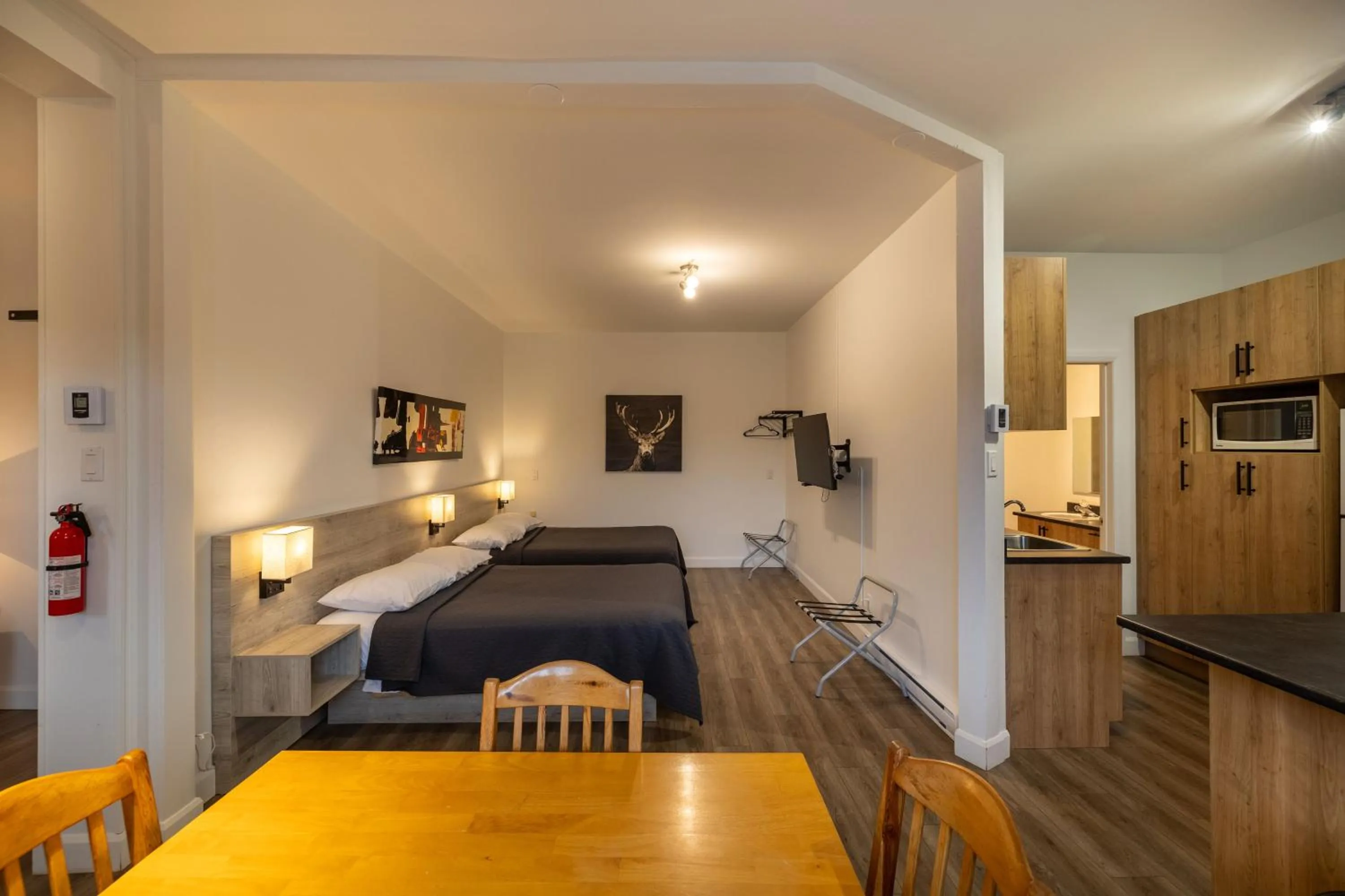 Bed in Motel Et Condo Chez Charley