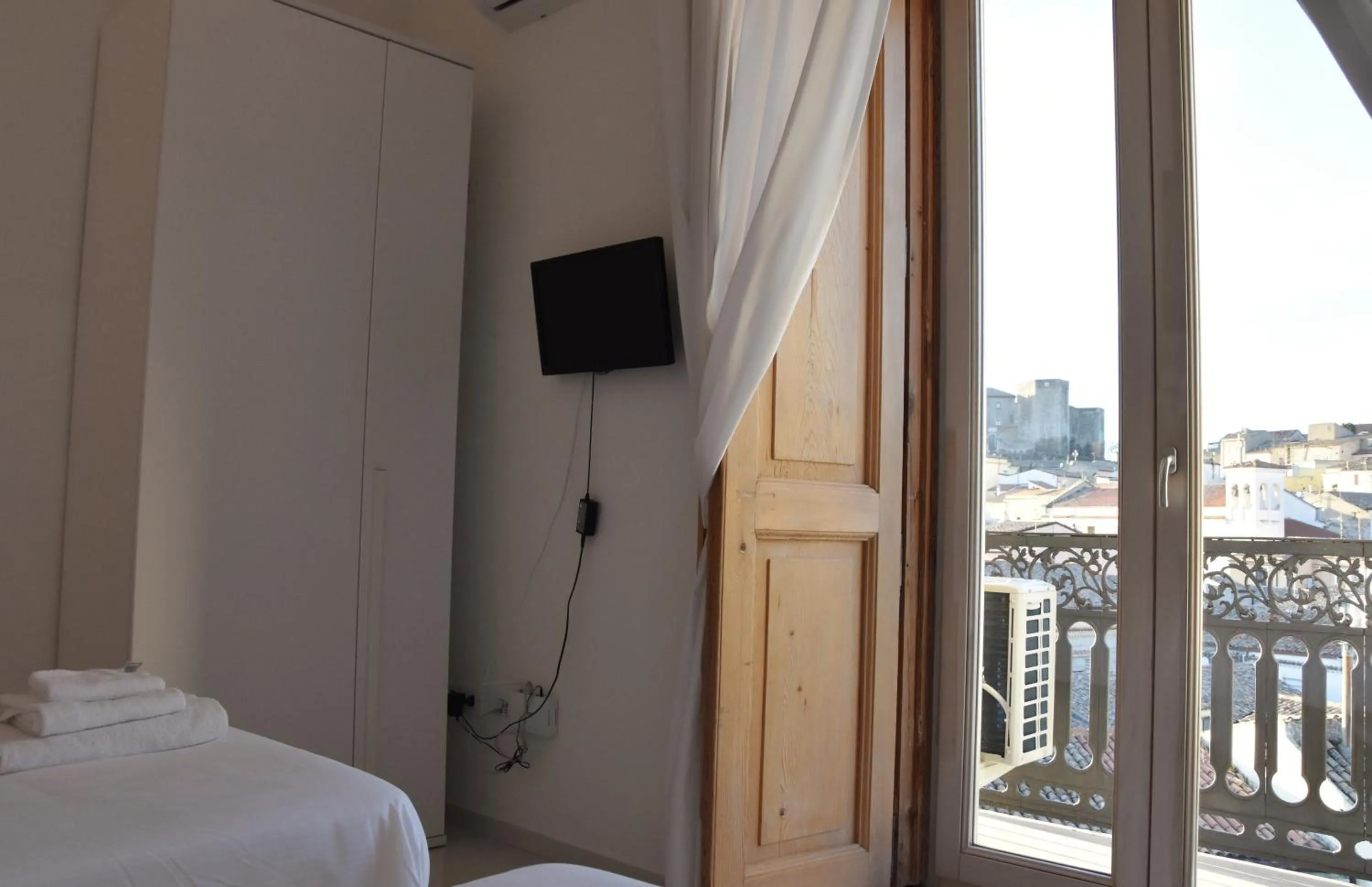 Photo of the whole room, Bed in La Casa nel Borgo Antico