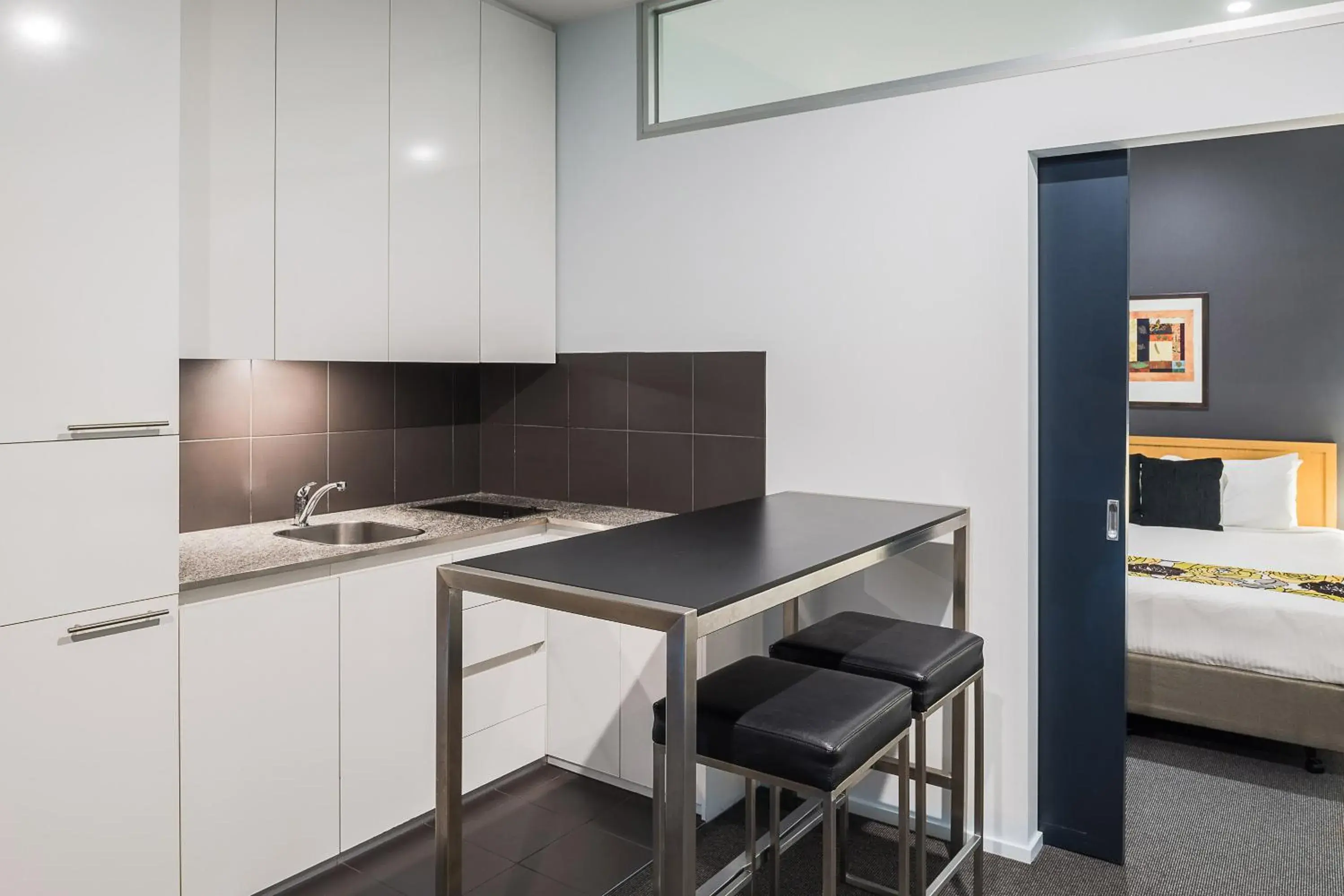 Kitchen or kitchenette, Bed in Mantra 100 Exhibition Kitchen or kitchenette, Bed in Mantra 100 Exhibition