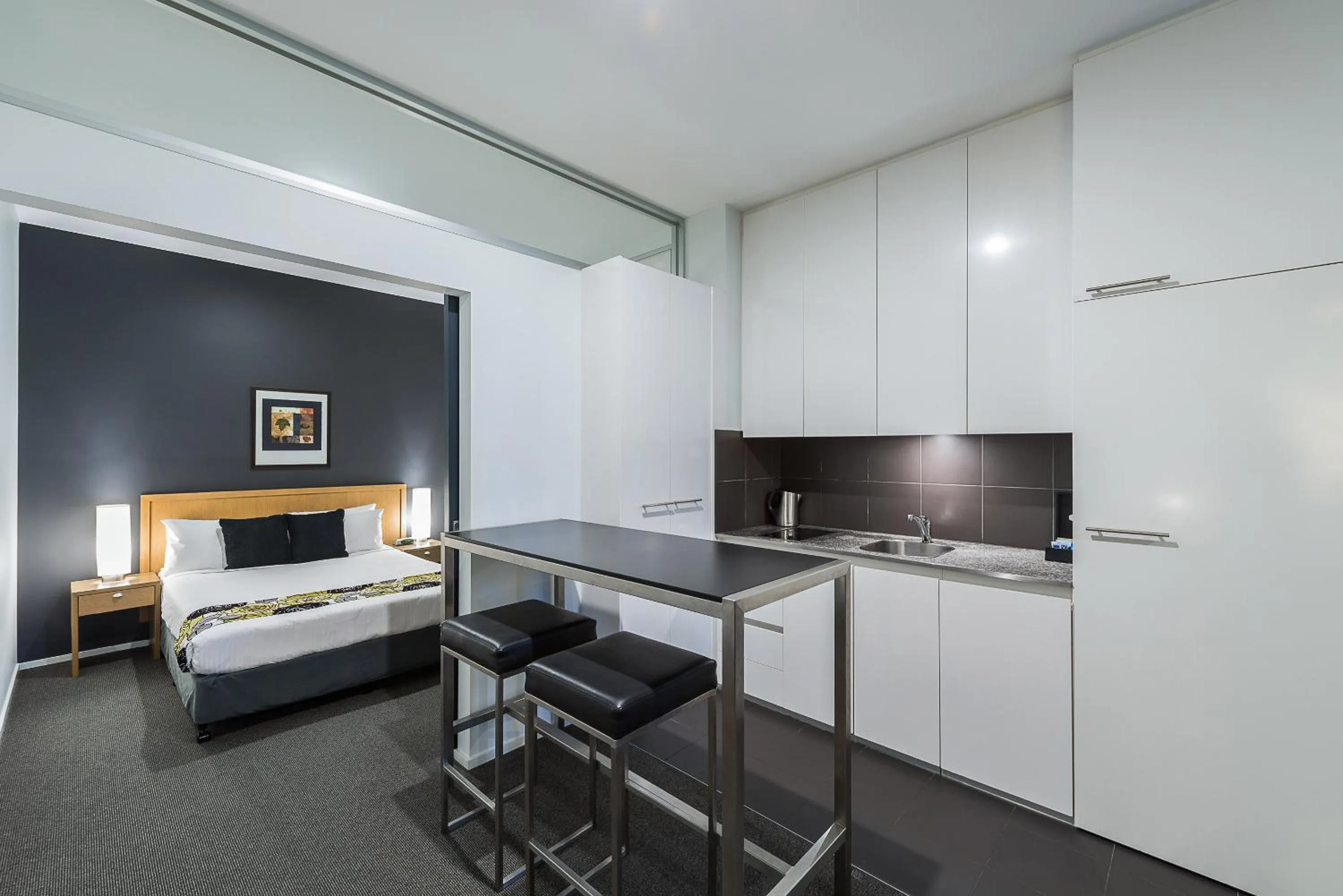 Kitchen or kitchenette, Bed in Mantra 100 Exhibition