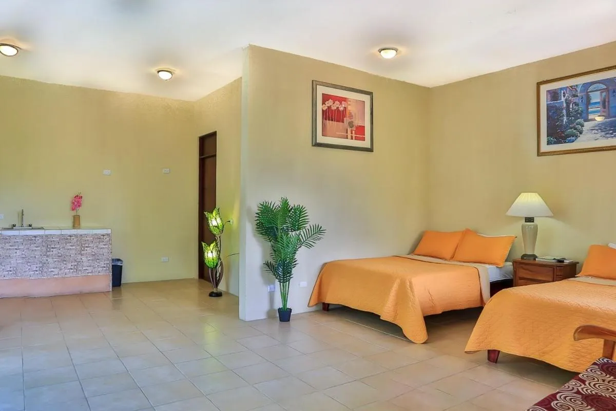 Bed in Pacifico Loft Hotel