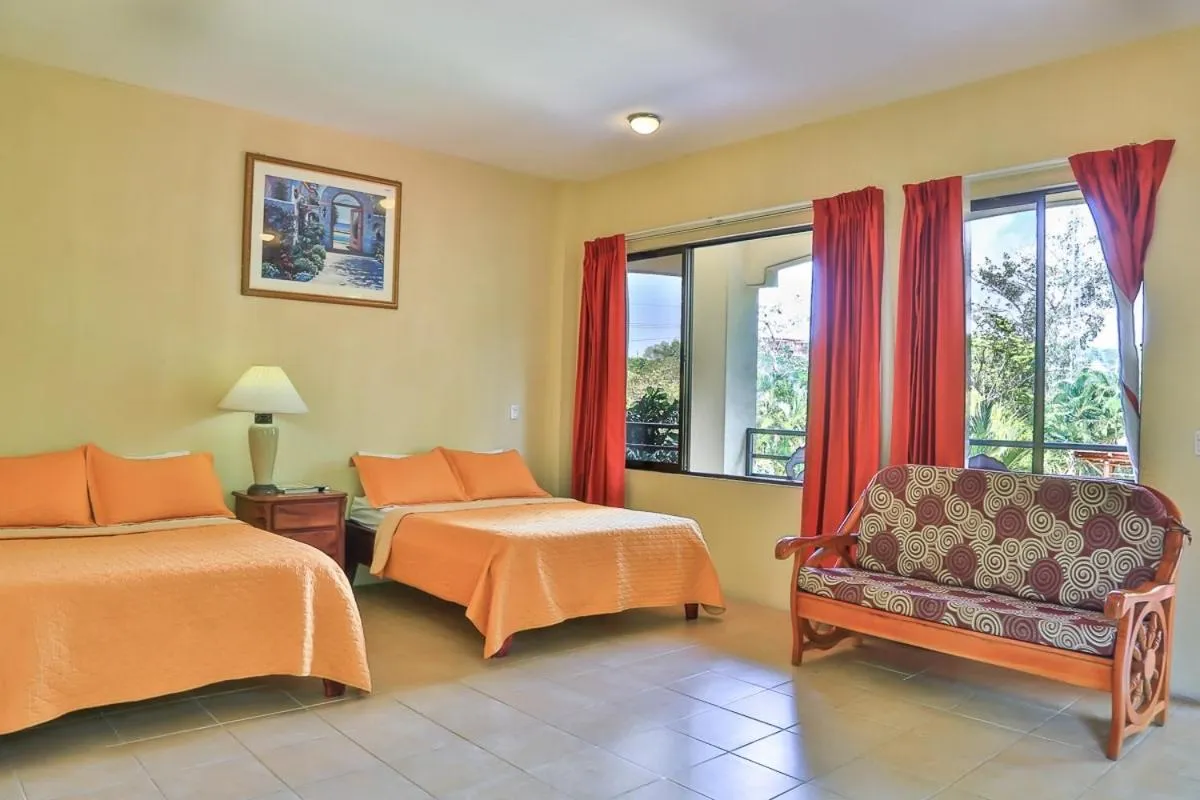 Bed in Pacifico Loft Hotel