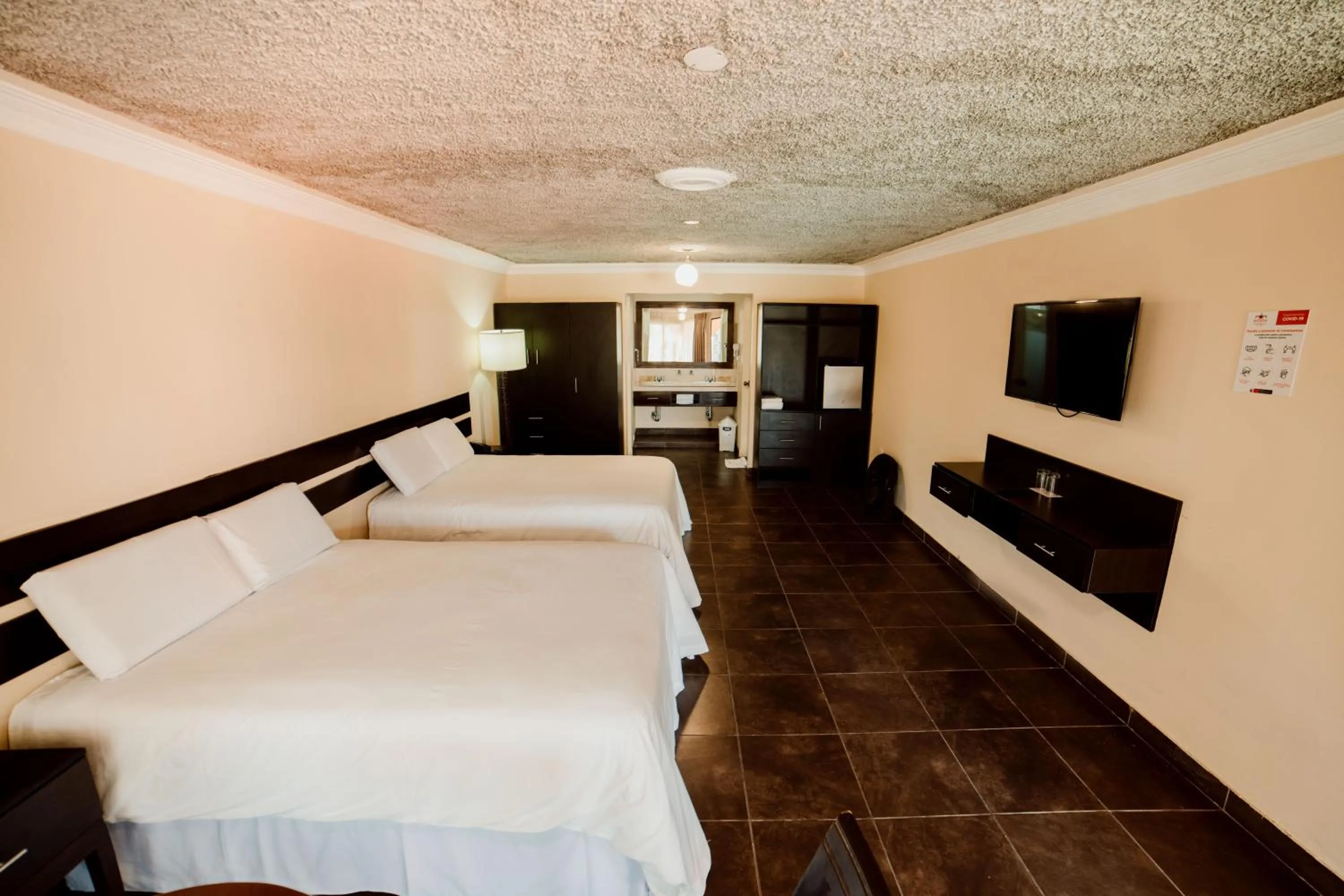 Photo of the whole room, Bed in Hacienda San Juan Resort