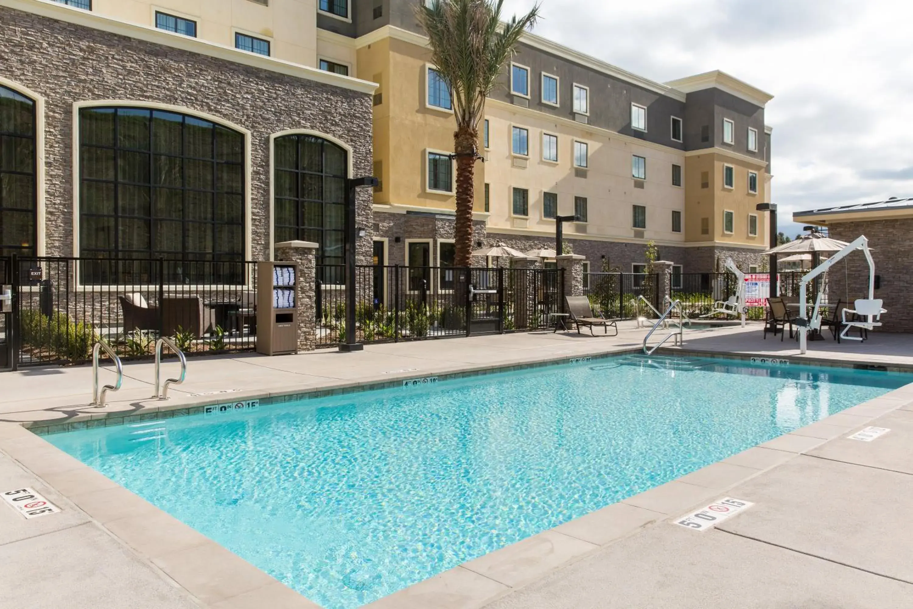 Swimming pool in Staybridge Suites Corona South by IHG Swimming pool in Staybridge Suites Corona South by IHG