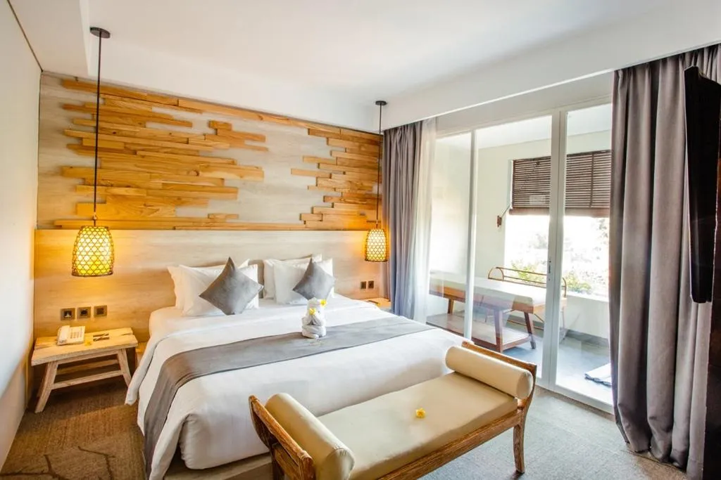 Bed in Jimbaran Bay Beach Resort and Spa by Prabhu