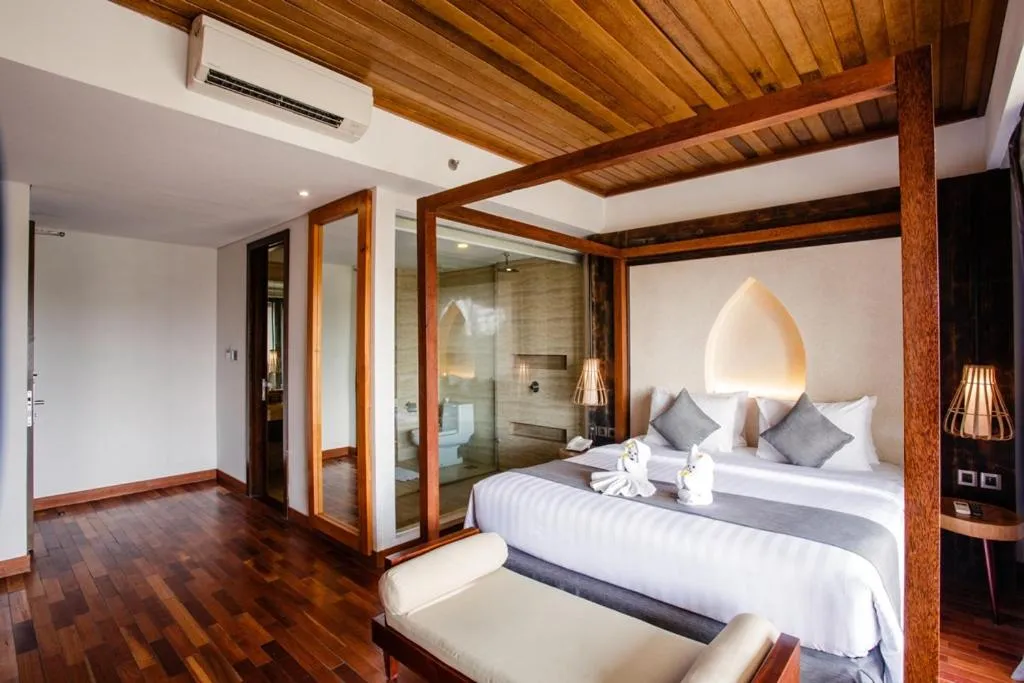 Bed in Jimbaran Bay Beach Resort and Spa by Prabhu