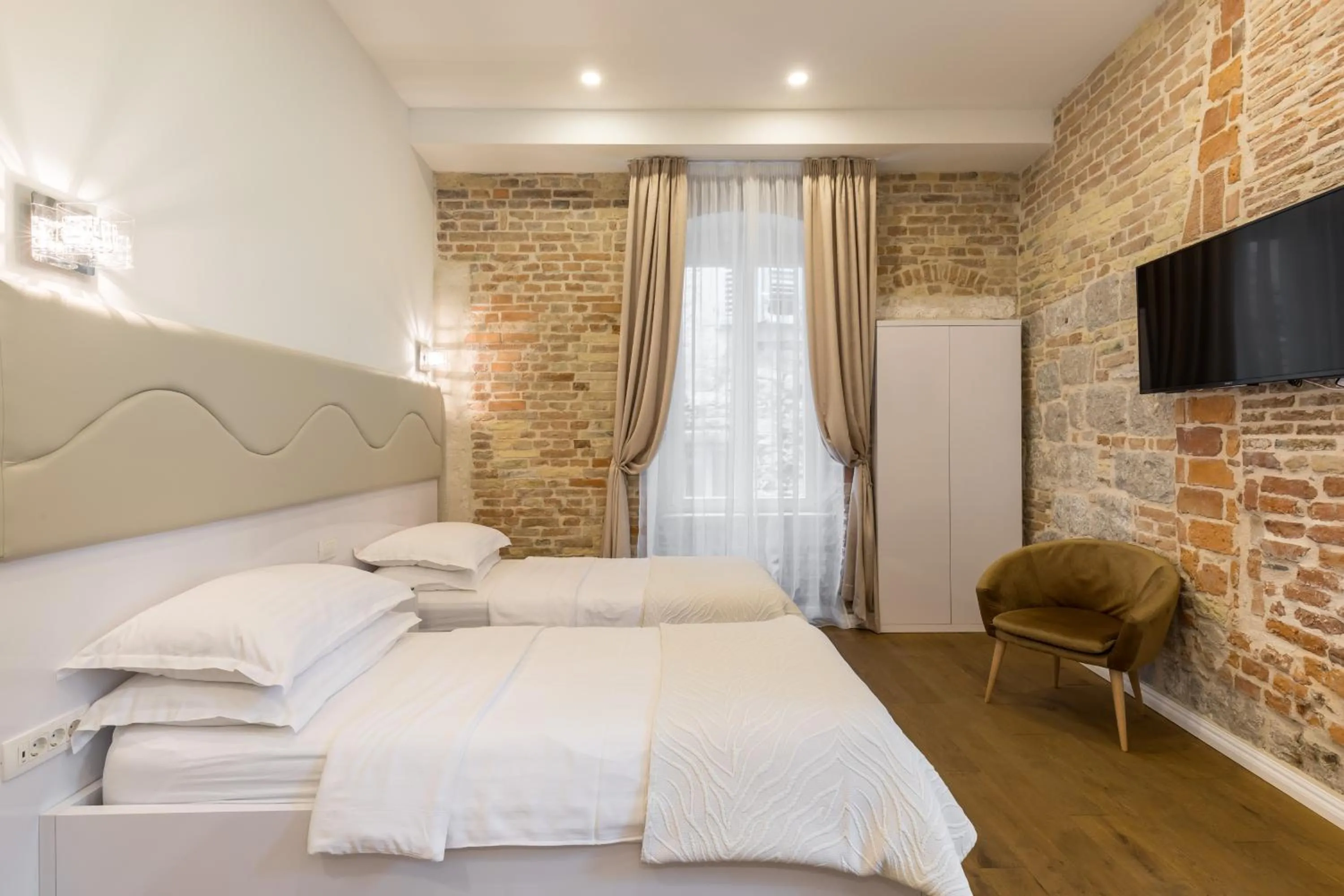 Bedroom, Bed in Pellegrini Luxury Rooms